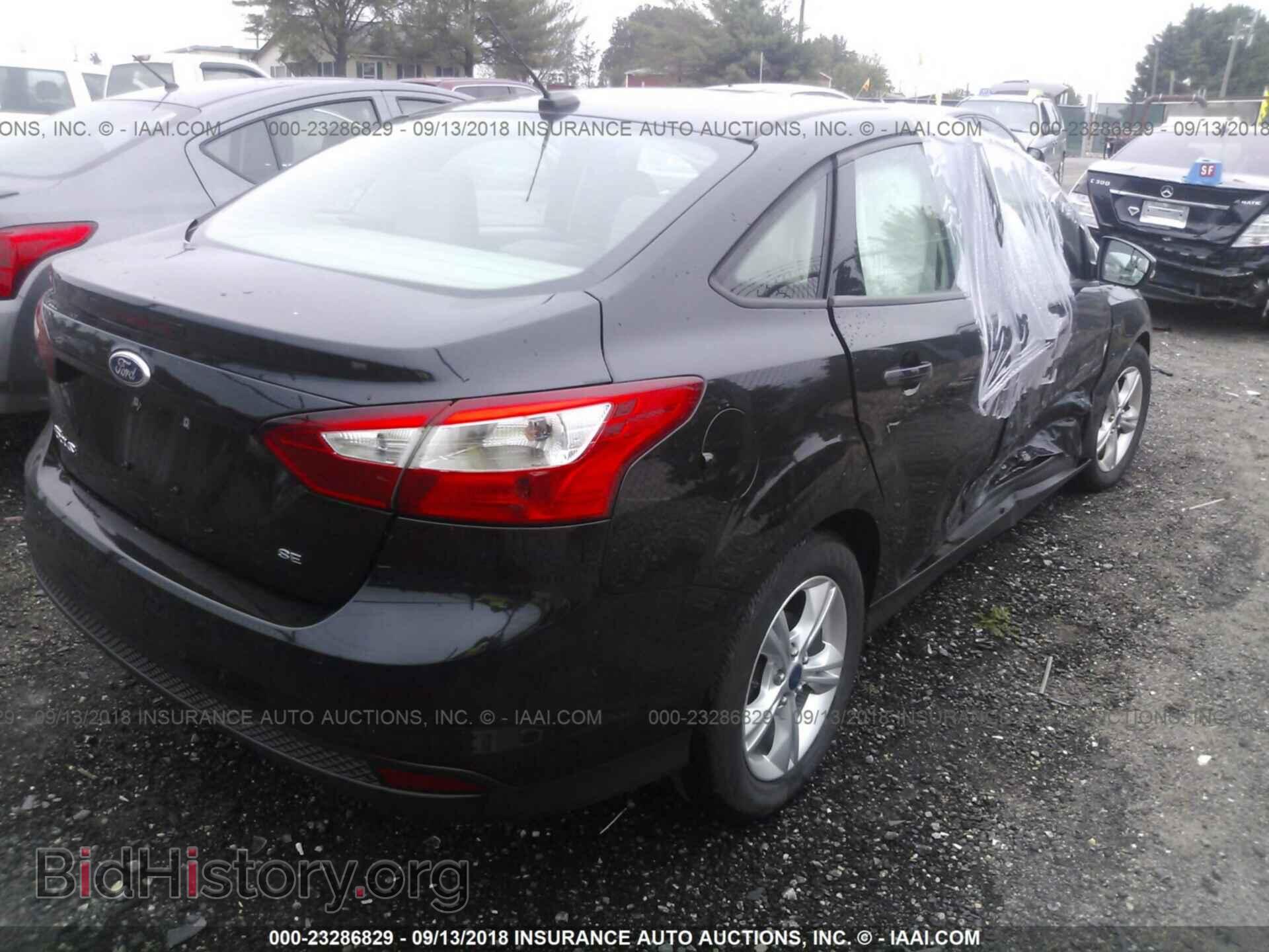 2013 Ford Focus - VIN: 1FADP3F2XDL375928 - Photo 4