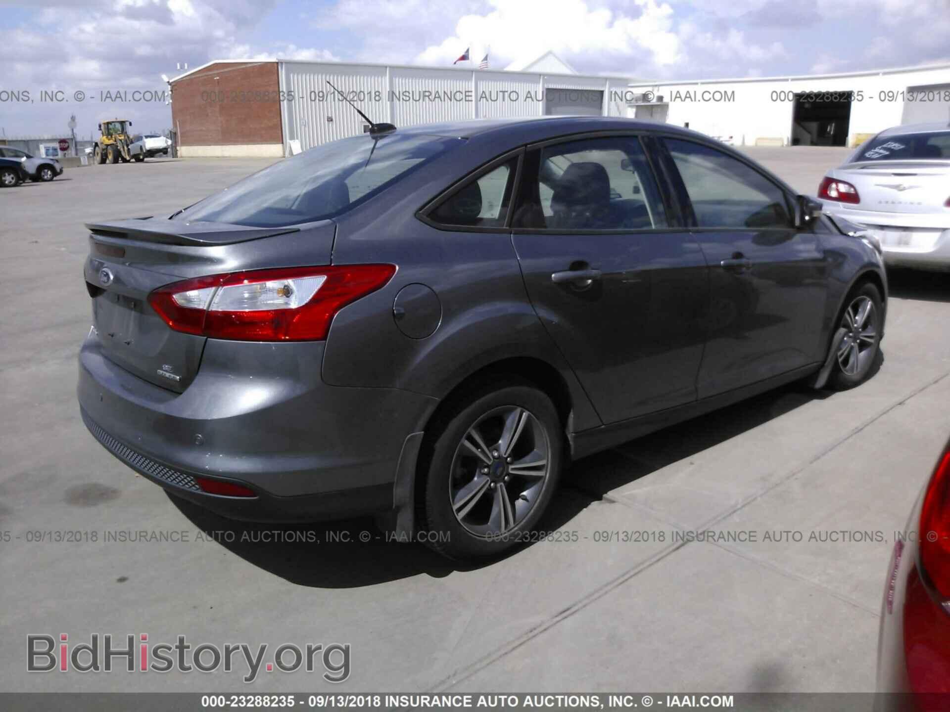 2014 Ford Focus - VIN: 1FADP3F22EL423956 - Фото 4