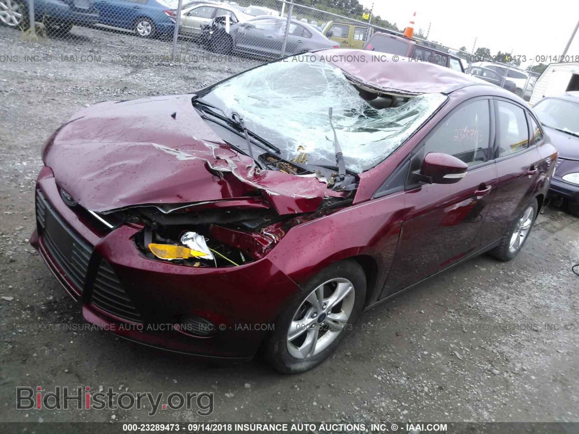 2014 Ford Focus - VIN: 1FADP3F27EL189099 - Фото 2
