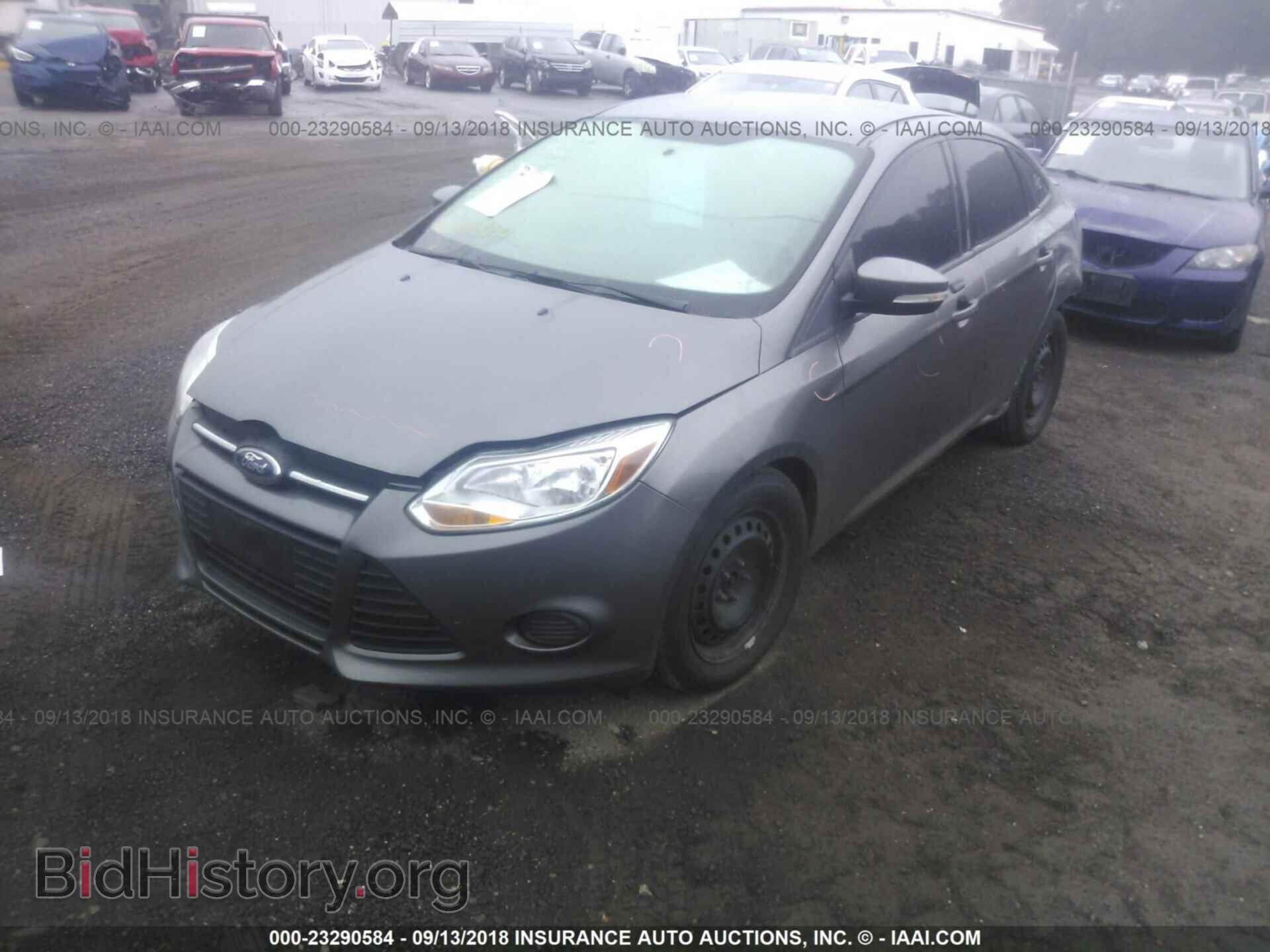2014 Ford Focus - VIN: 1FADP3F21EL387922 - Фото 2