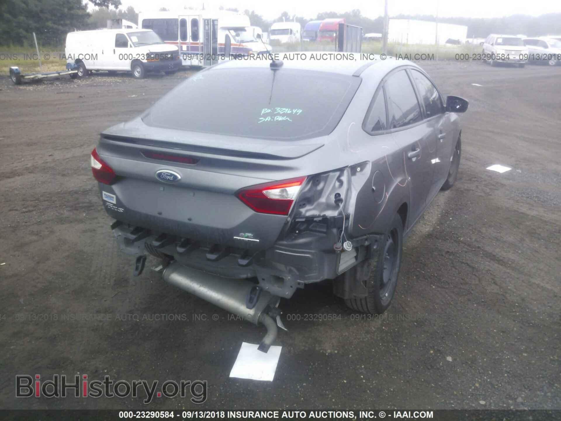 2014 Ford Focus - VIN: 1FADP3F21EL387922 - Фото 4