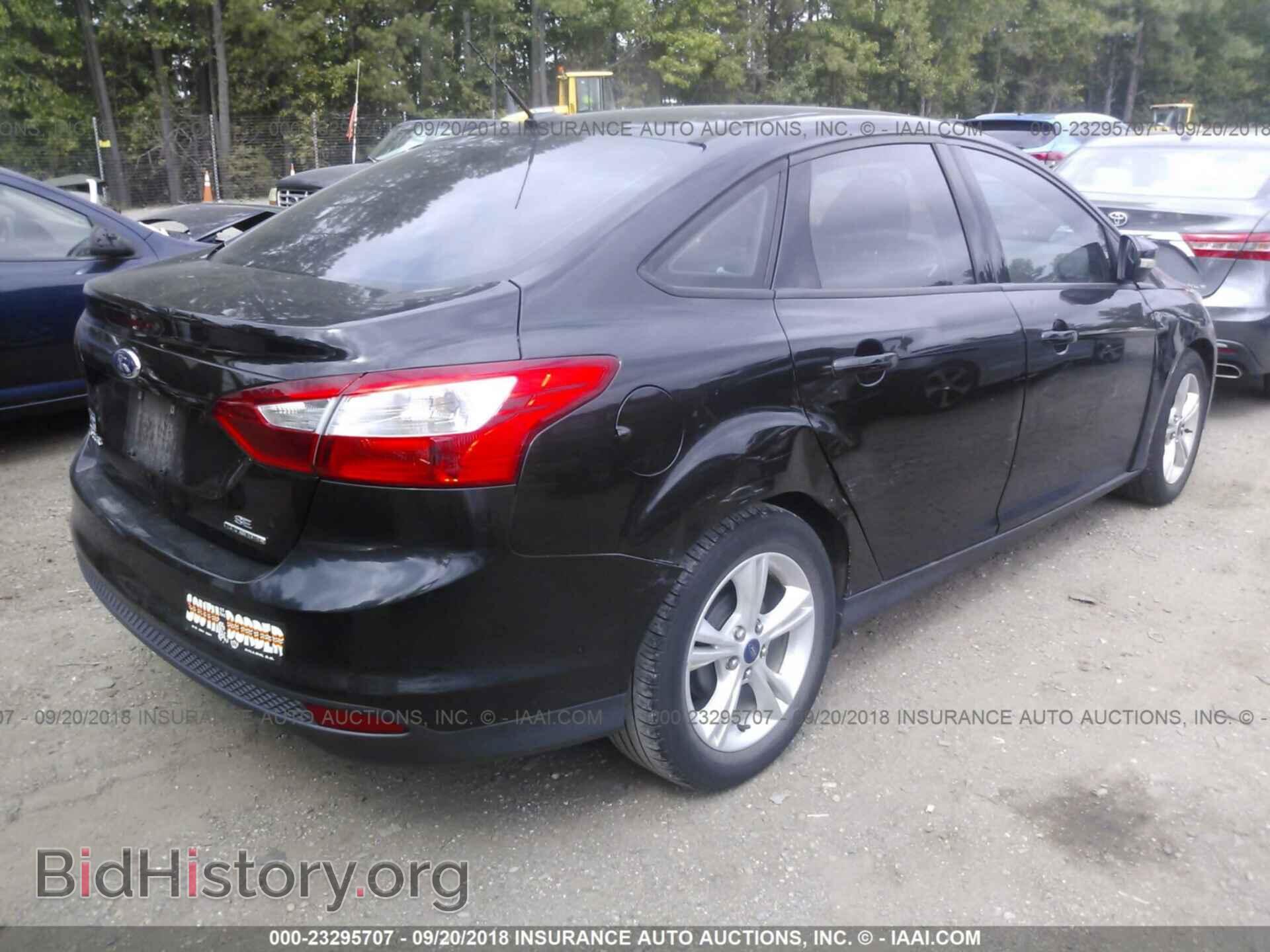 2014 Ford Focus - VIN: 1FADP3F20EL369069 - Фото 4