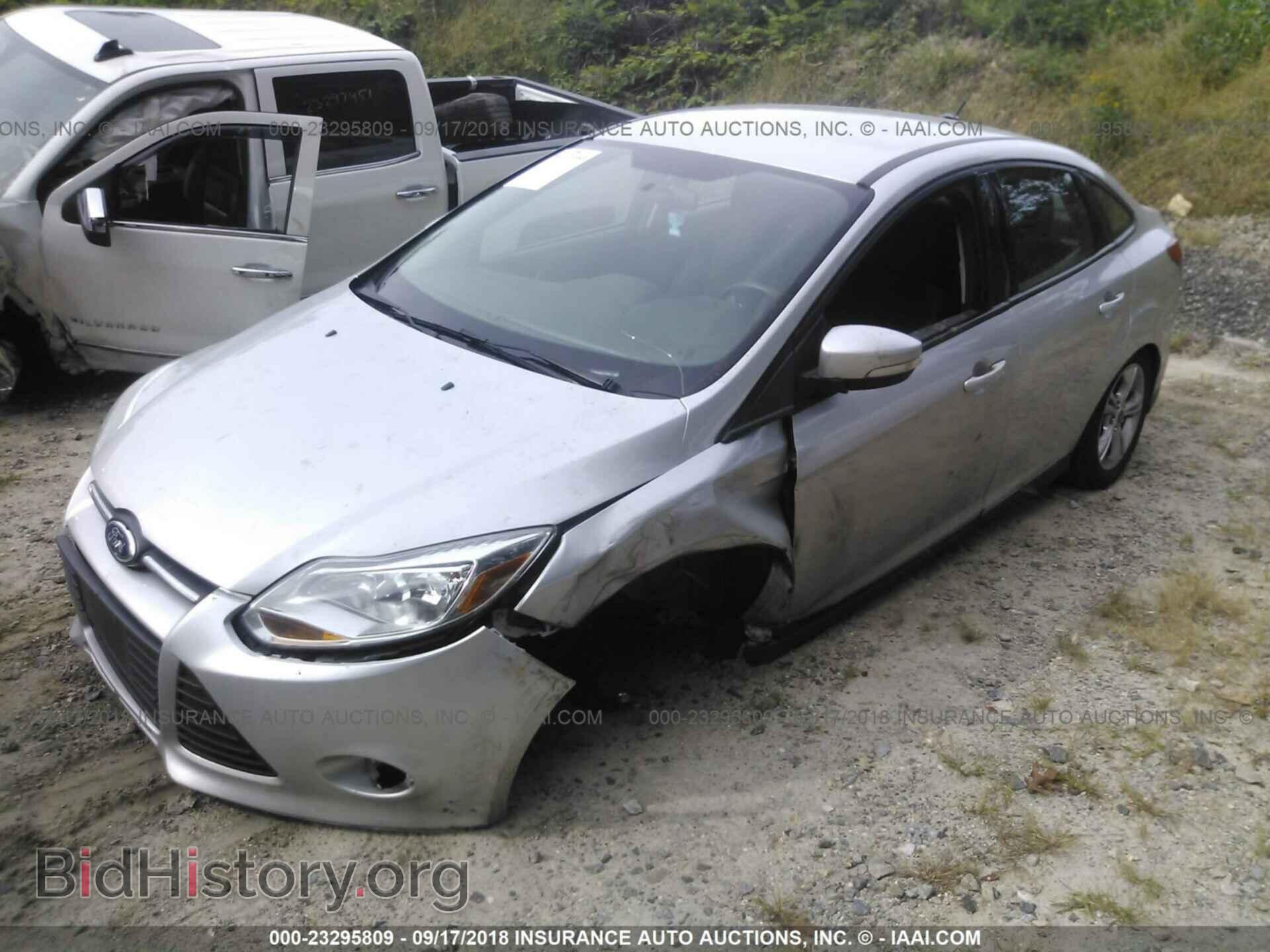 2014 Ford Focus - VIN: 1FADP3F20EL171981 - Фото 2