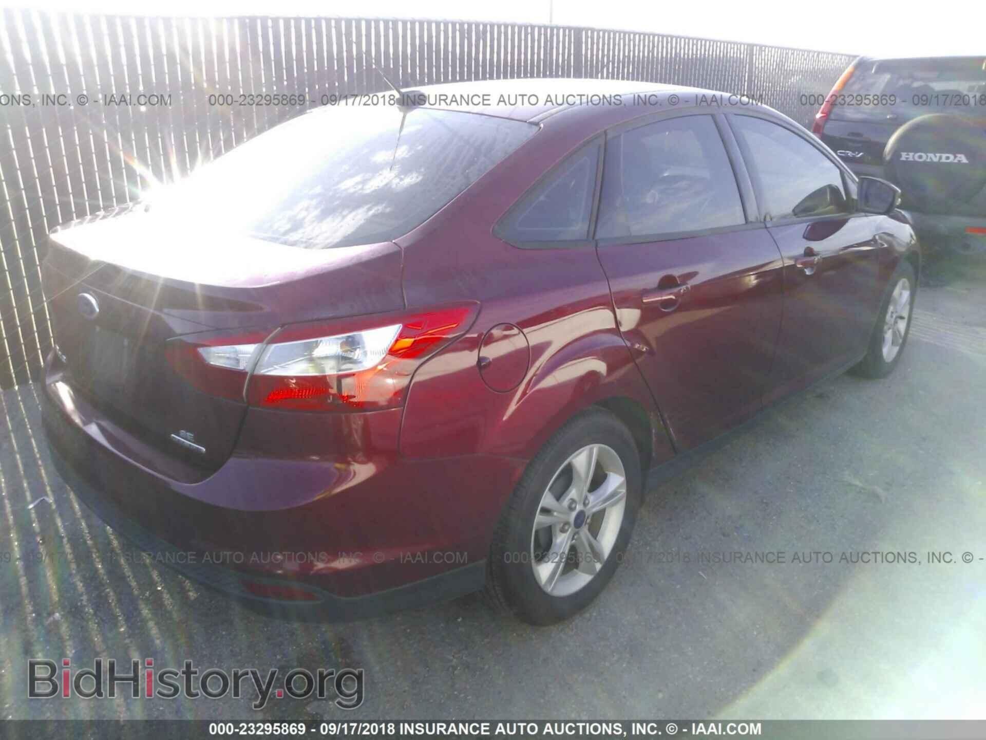 2014 Ford Focus - VIN: 1FADP3F22EL429997 - Photo 4