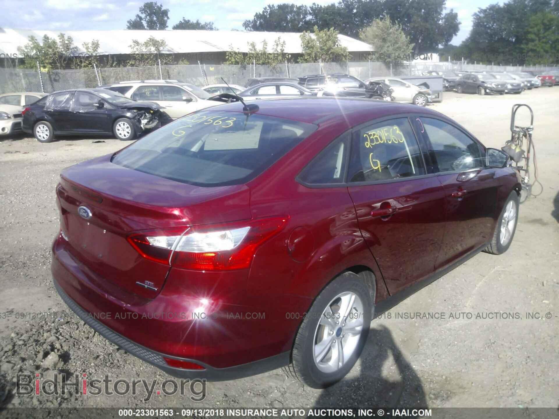 2014 Ford Focus - VIN: 1FADP3F28EL420656 - Photo 4