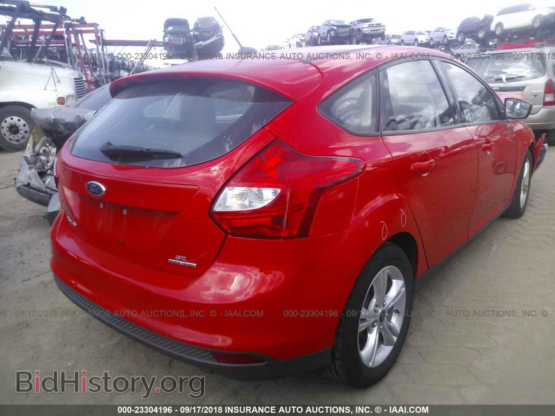 2014 Ford Focus - VIN: 1FADP3K22EL333809 - Фото 4