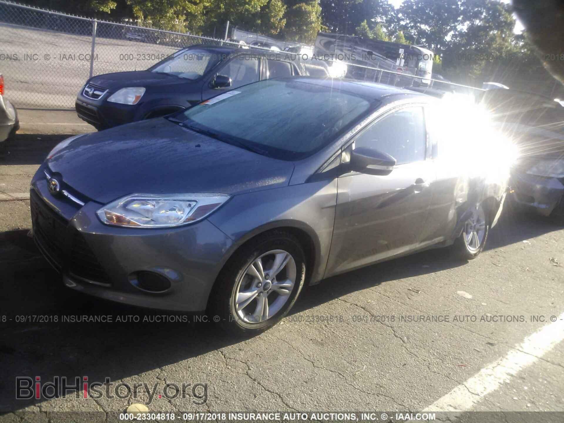 2014 Ford Focus - VIN: 1FADP3F24EL396033 - Фото 2
