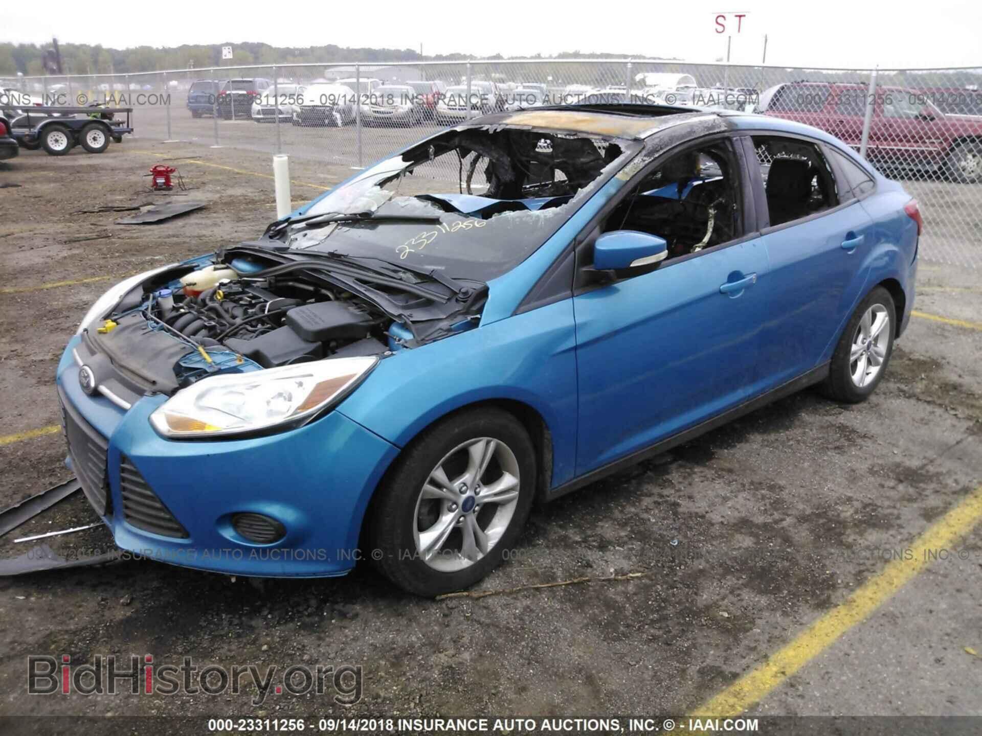 2014 Ford Focus - VIN: 1FADP3F28EL242165 - Фото 2