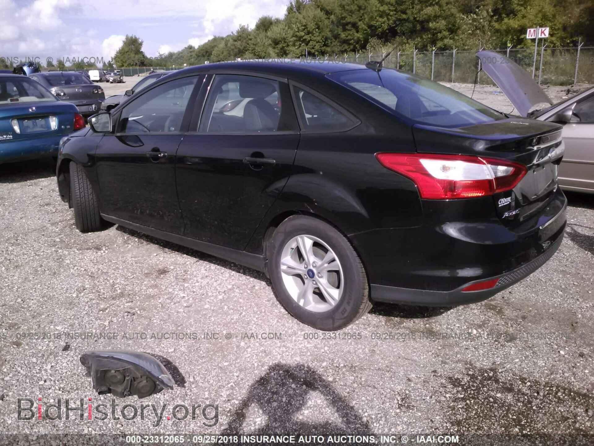 2014 Ford Focus - VIN: 1FADP3F29EL310165 - Фото 3