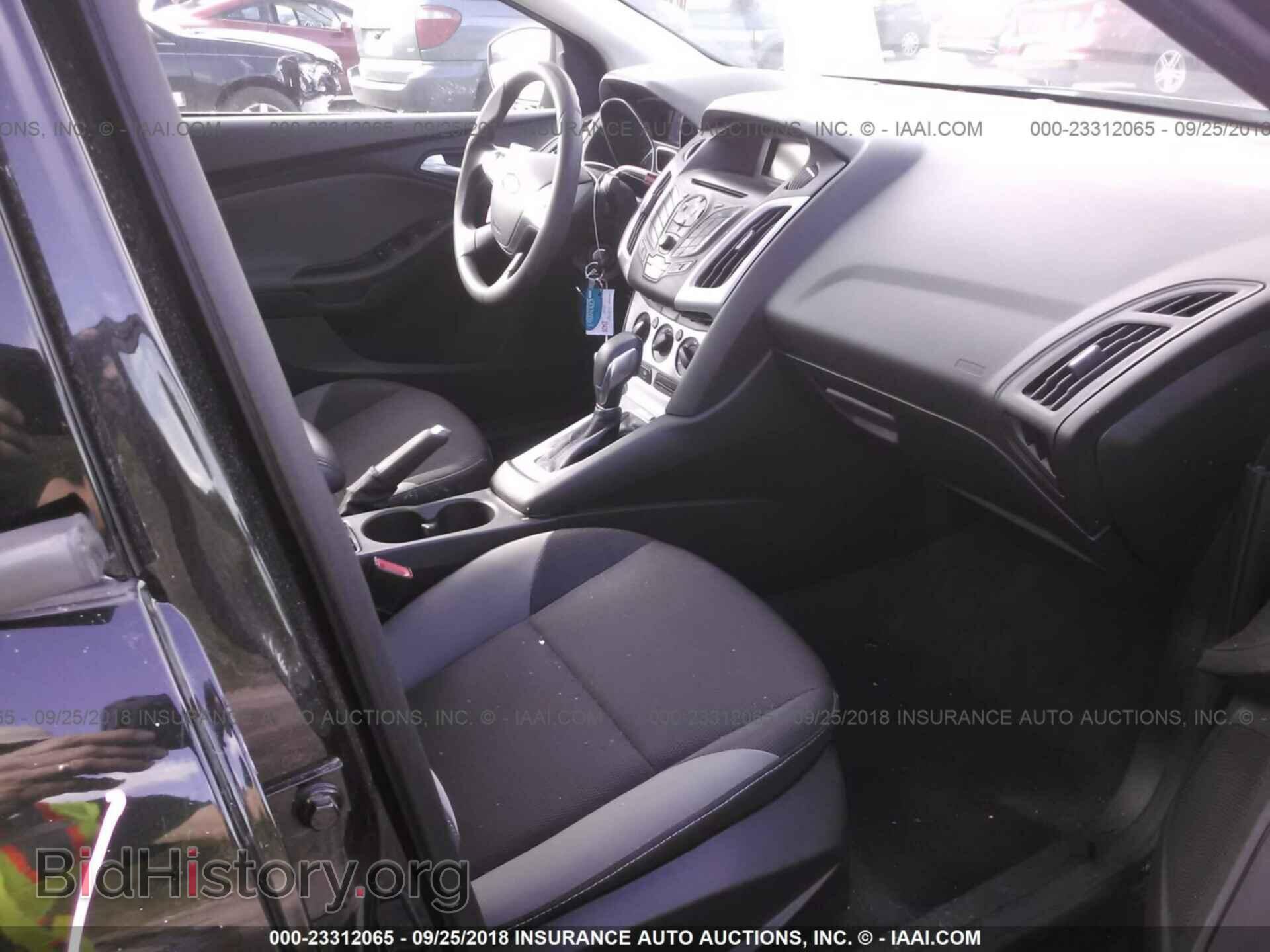2014 Ford Focus - VIN: 1FADP3F29EL310165 - Фото 5