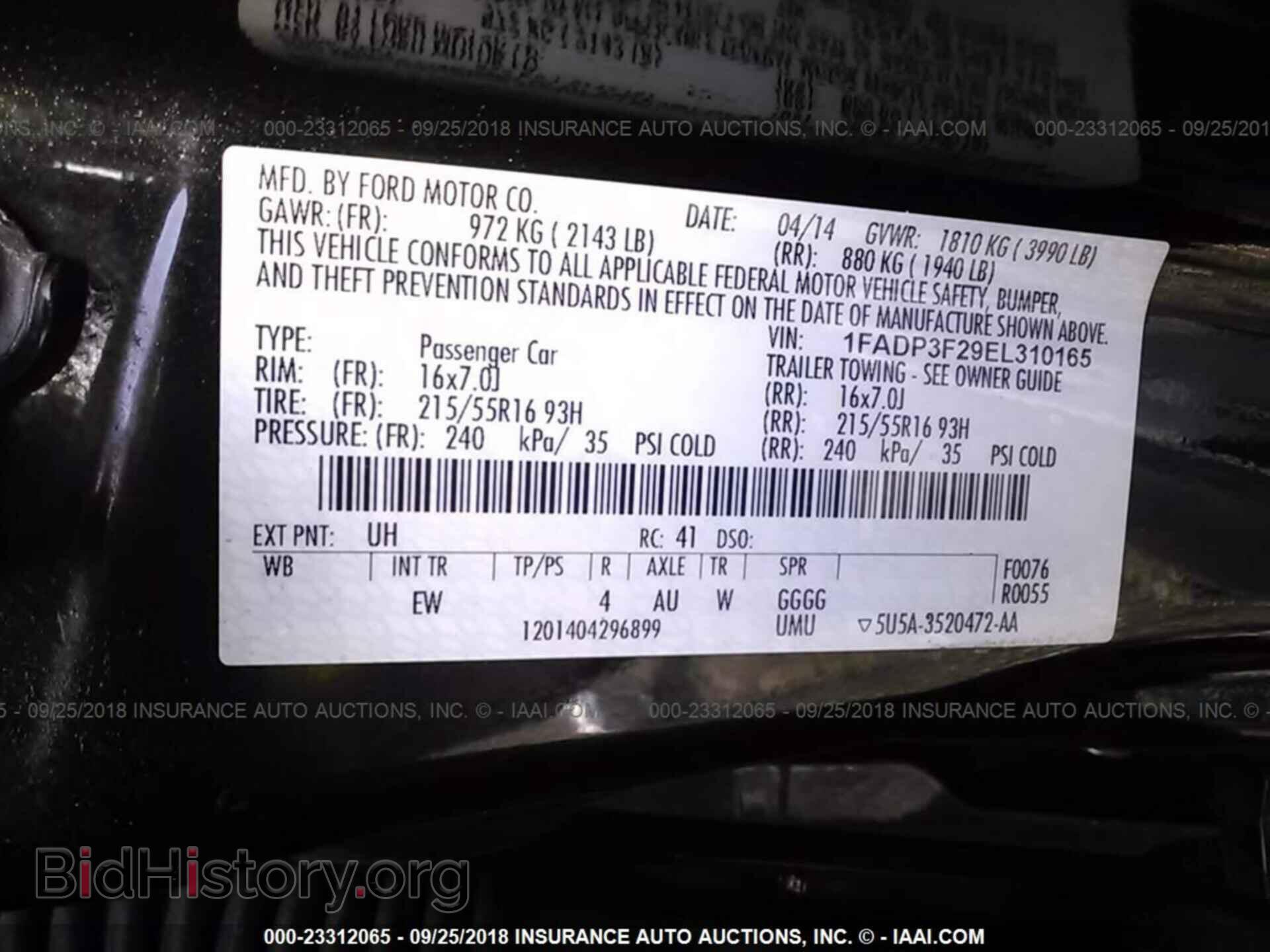2014 Ford Focus - VIN: 1FADP3F29EL310165 - Фото 9