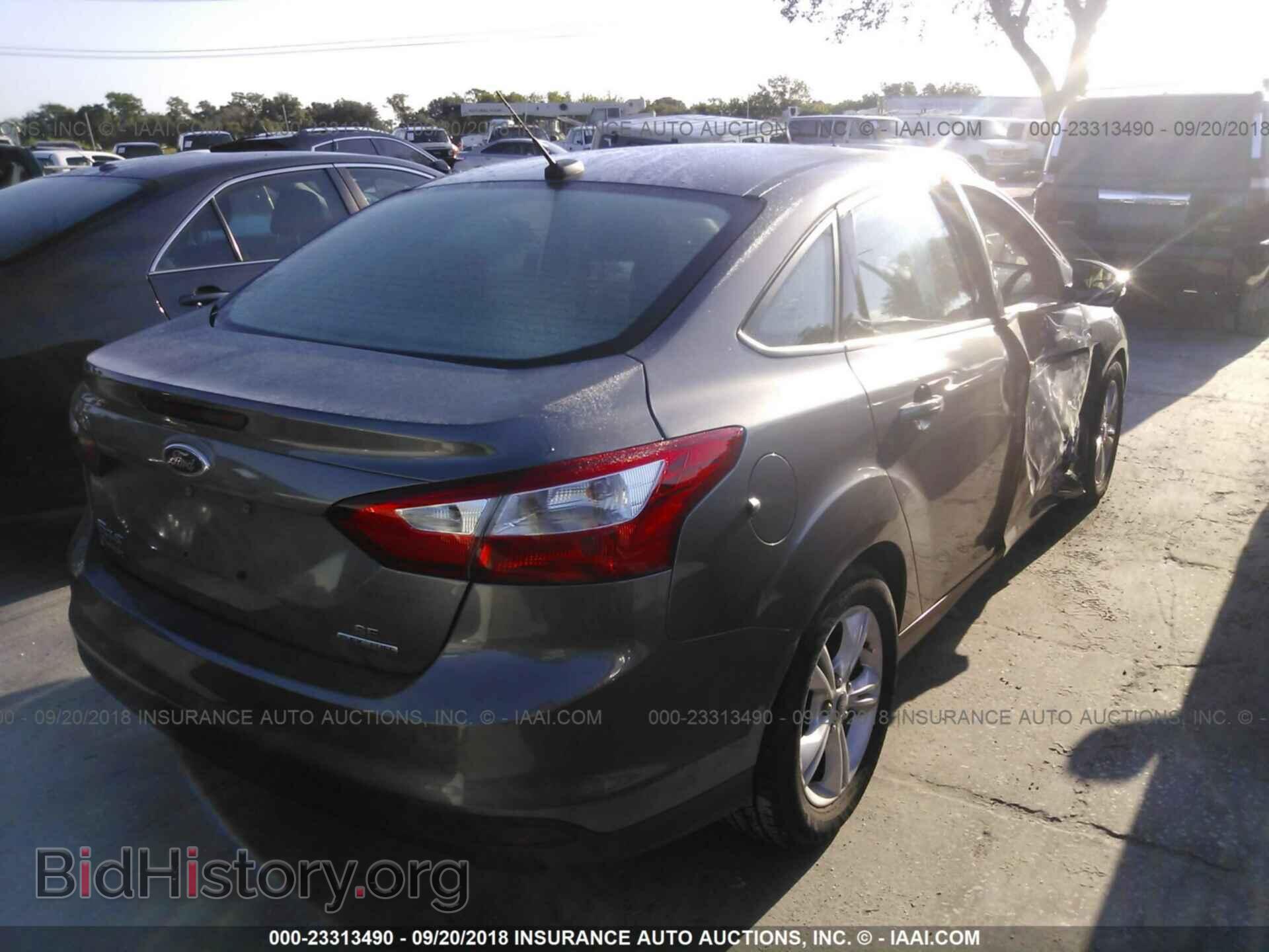 2014 Ford Focus - VIN: 1FADP3F29EL426420 - Фото 4