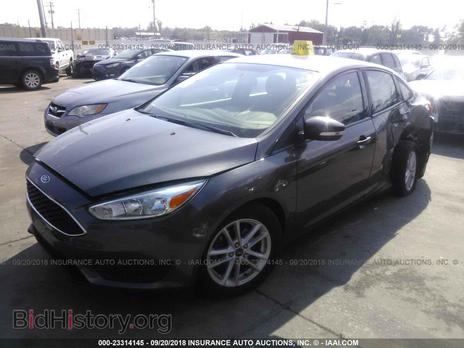 2016 Ford Focus - VIN: 1FADP3F20GL214458 - Photo 2