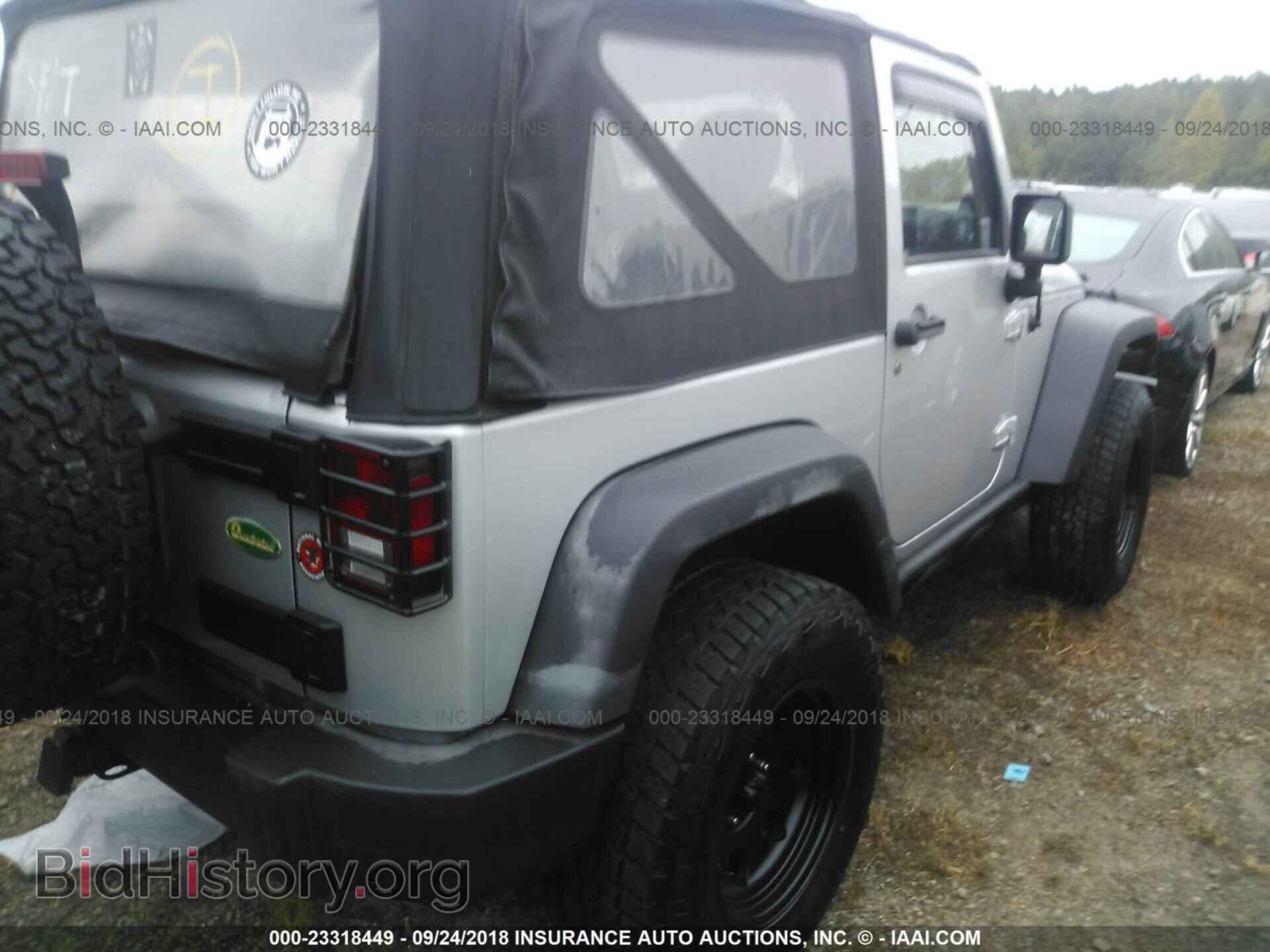 2011 Jeep Wrangler - VIN: 1J4AA2D17BL628116 - Фото 4