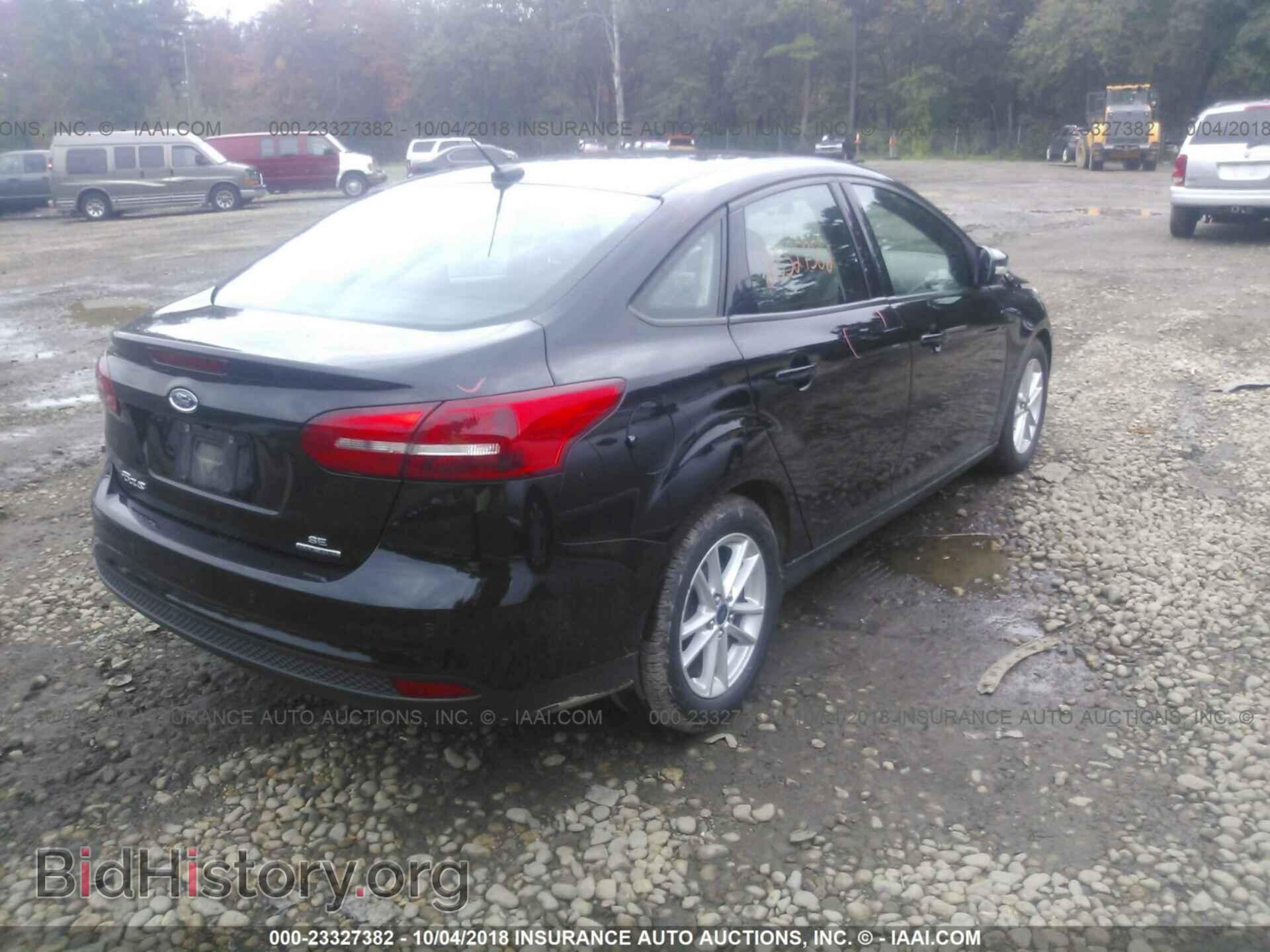 2016 FORD FOCUS - VIN: 1FADP3F21GL240194 - Photo 4