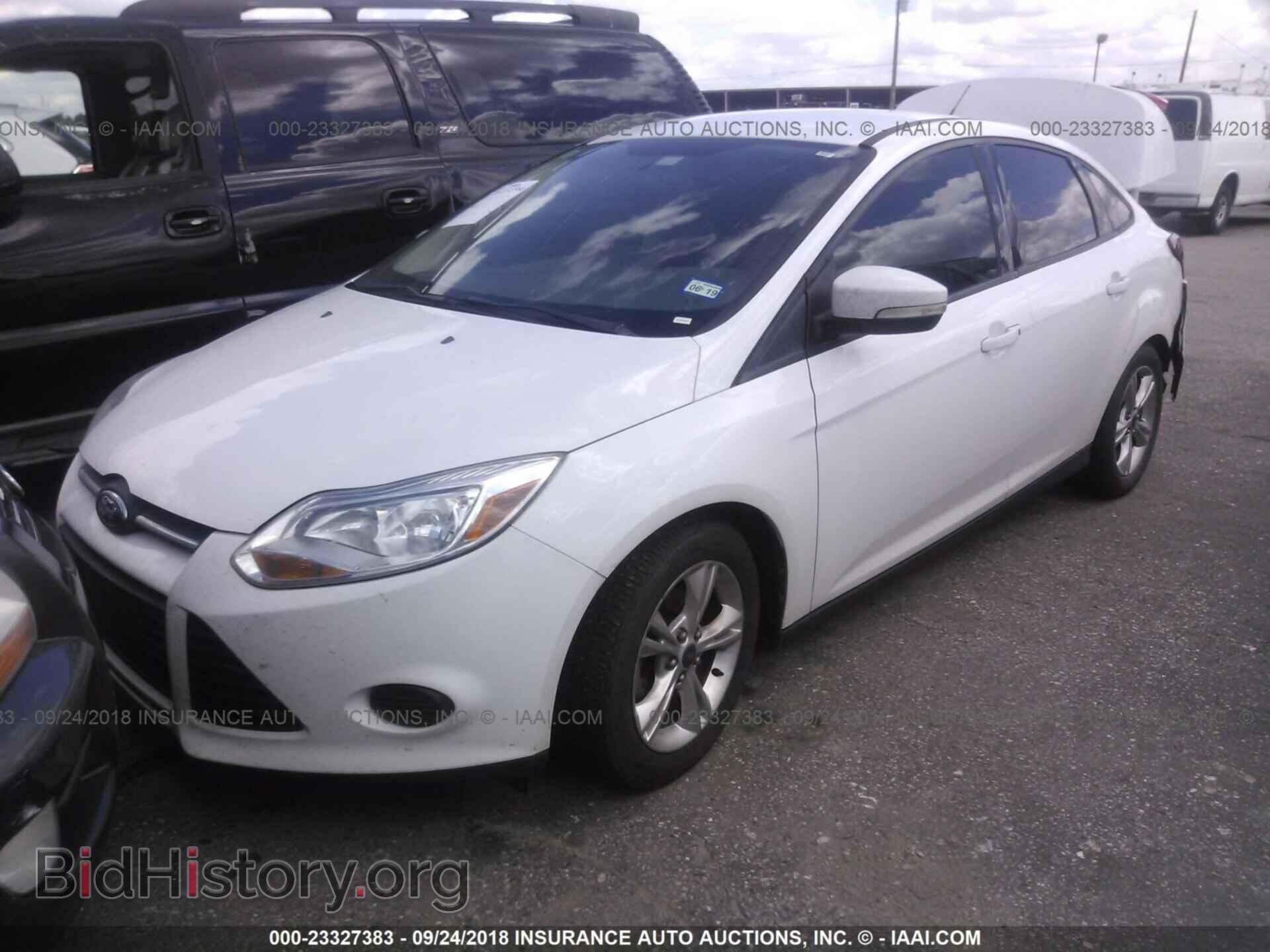 2014 Ford Focus - VIN: 1FADP3F20EL155554 - Фото 2