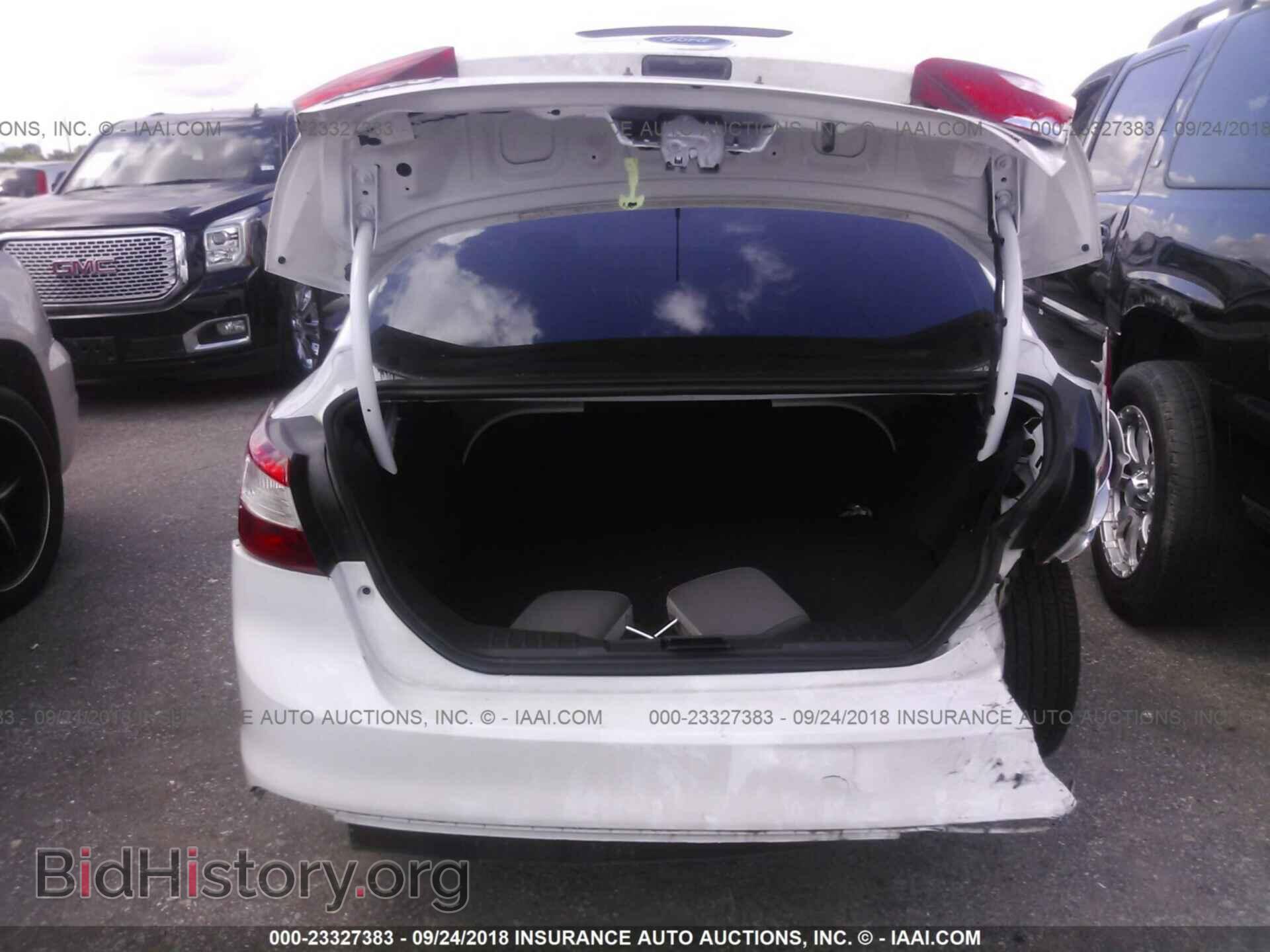 2014 Ford Focus - VIN: 1FADP3F20EL155554 - Фото 6