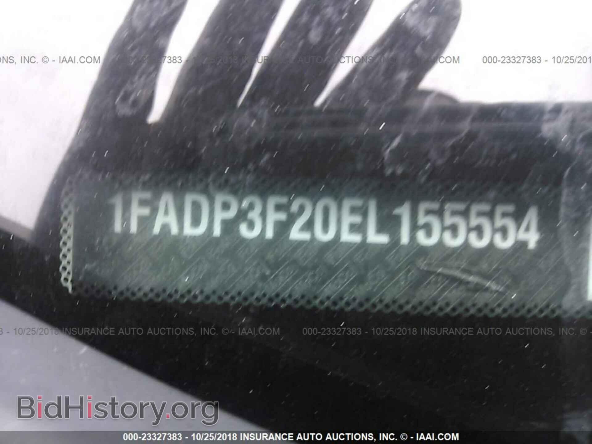 2014 Ford Focus - VIN: 1FADP3F20EL155554 - Фото 9