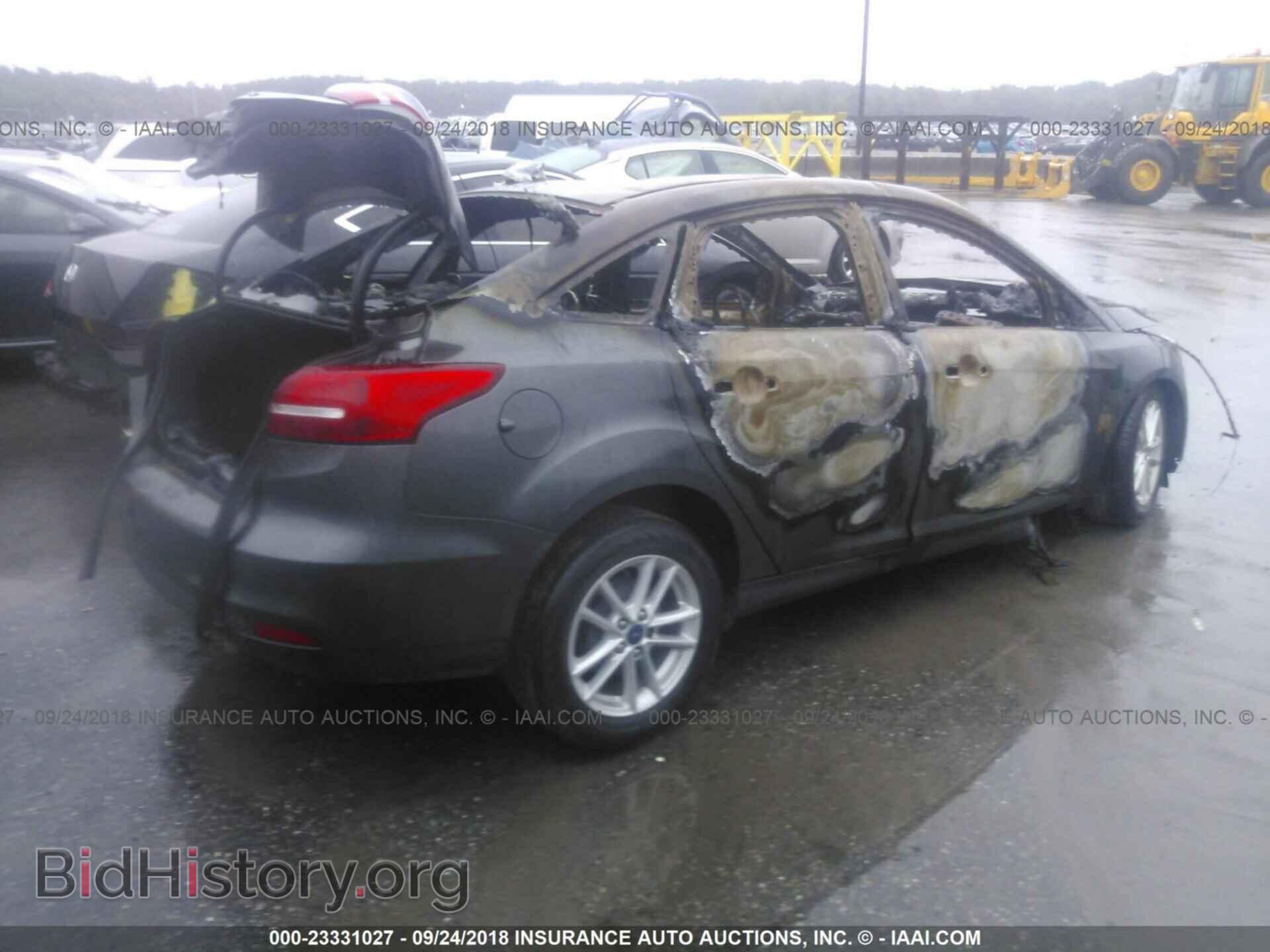 2016 Ford Focus - VIN: 1FADP3F2XGL335594 - Photo 4