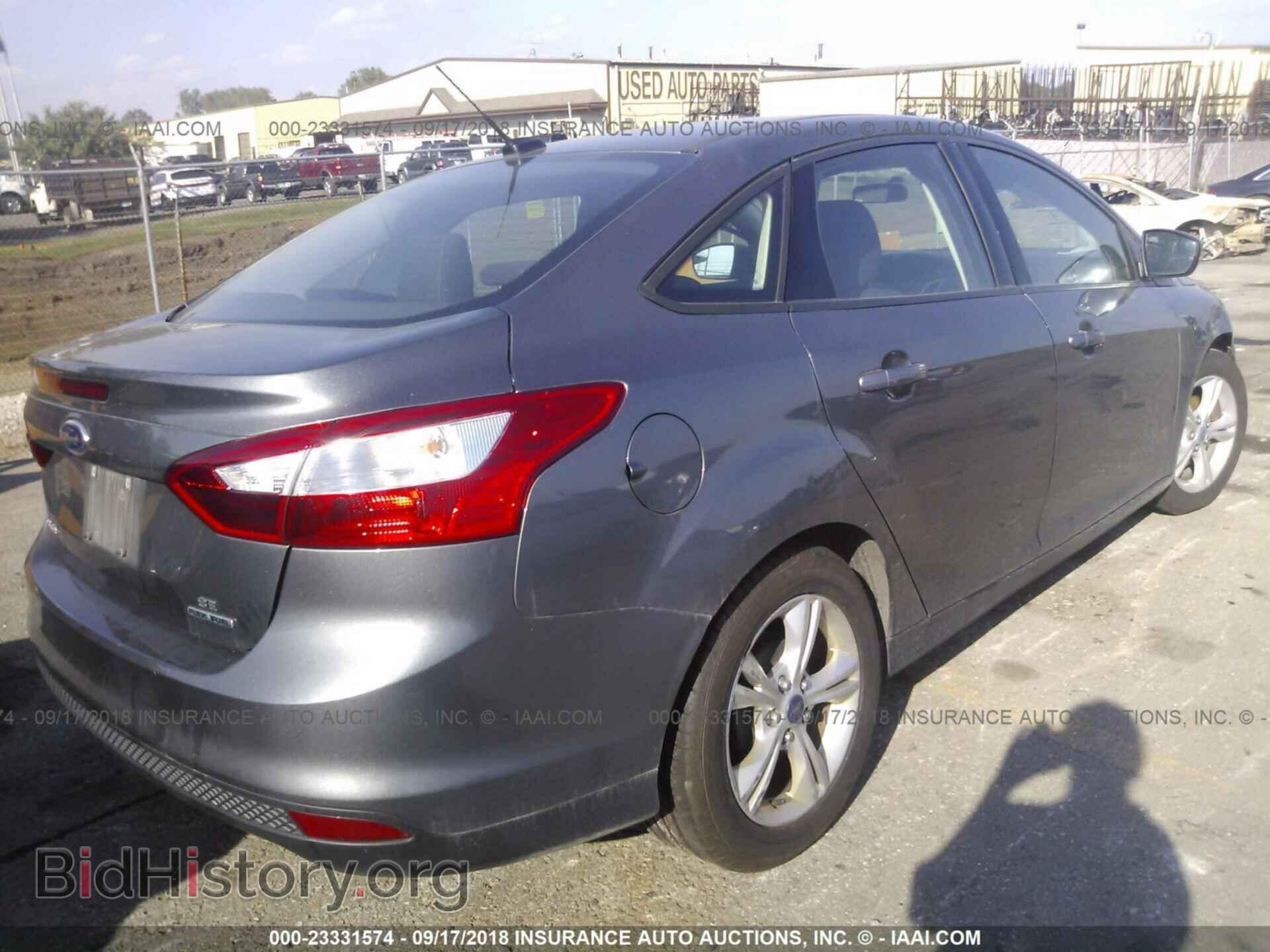 2014 Ford Focus - VIN: 1FADP3F2XEL132802 - Photo 4