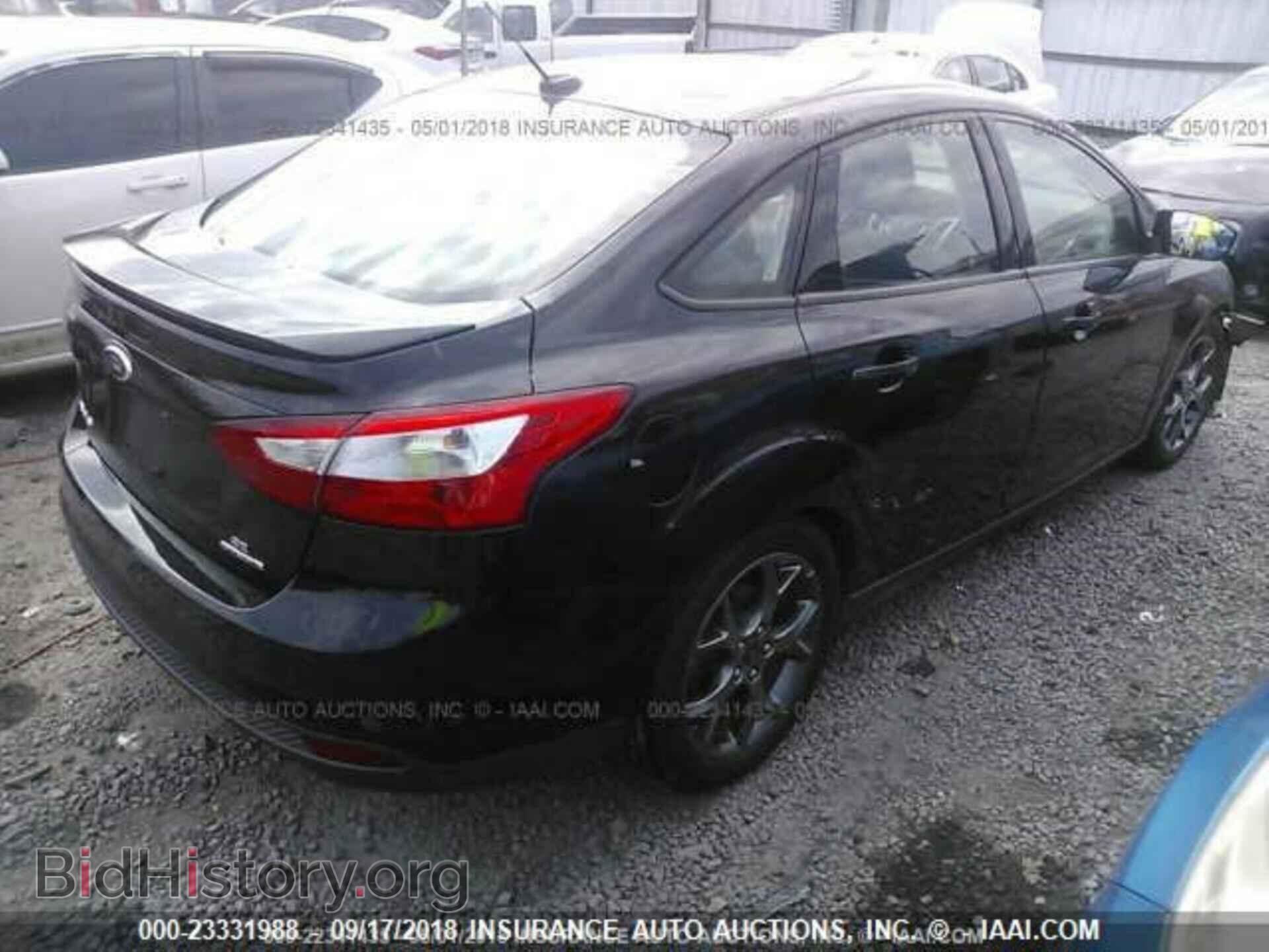 2014 Ford Focus - VIN: 1FADP3F27EL239323 - Photo 4