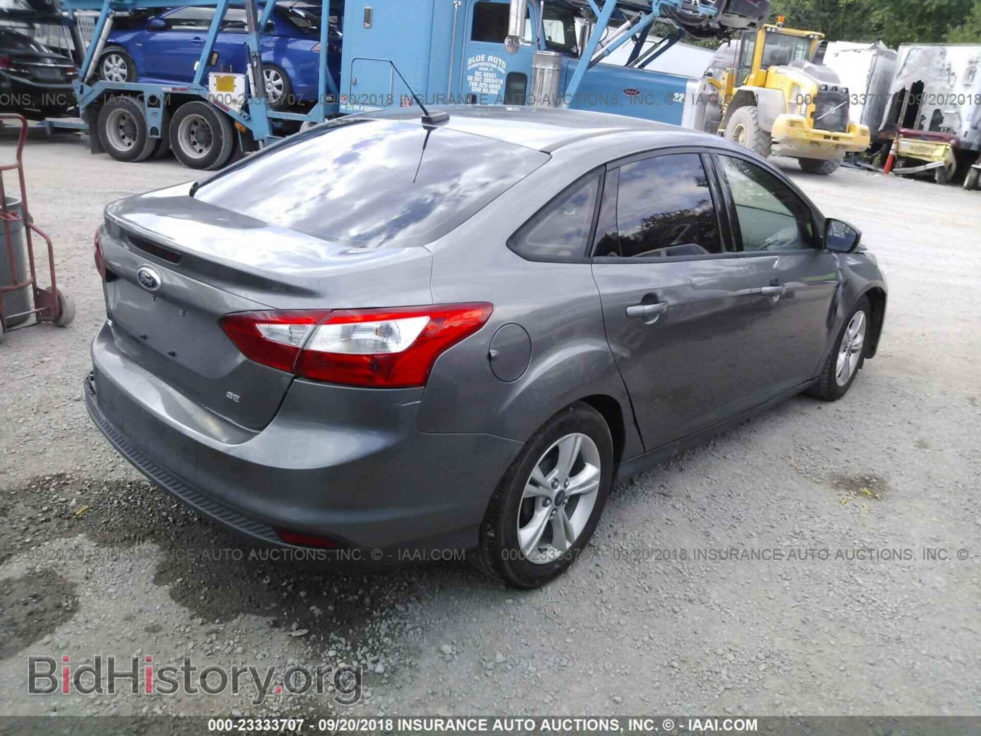 2014 Ford Focus - VIN: 1FADP3F22EL238189 - Photo 4