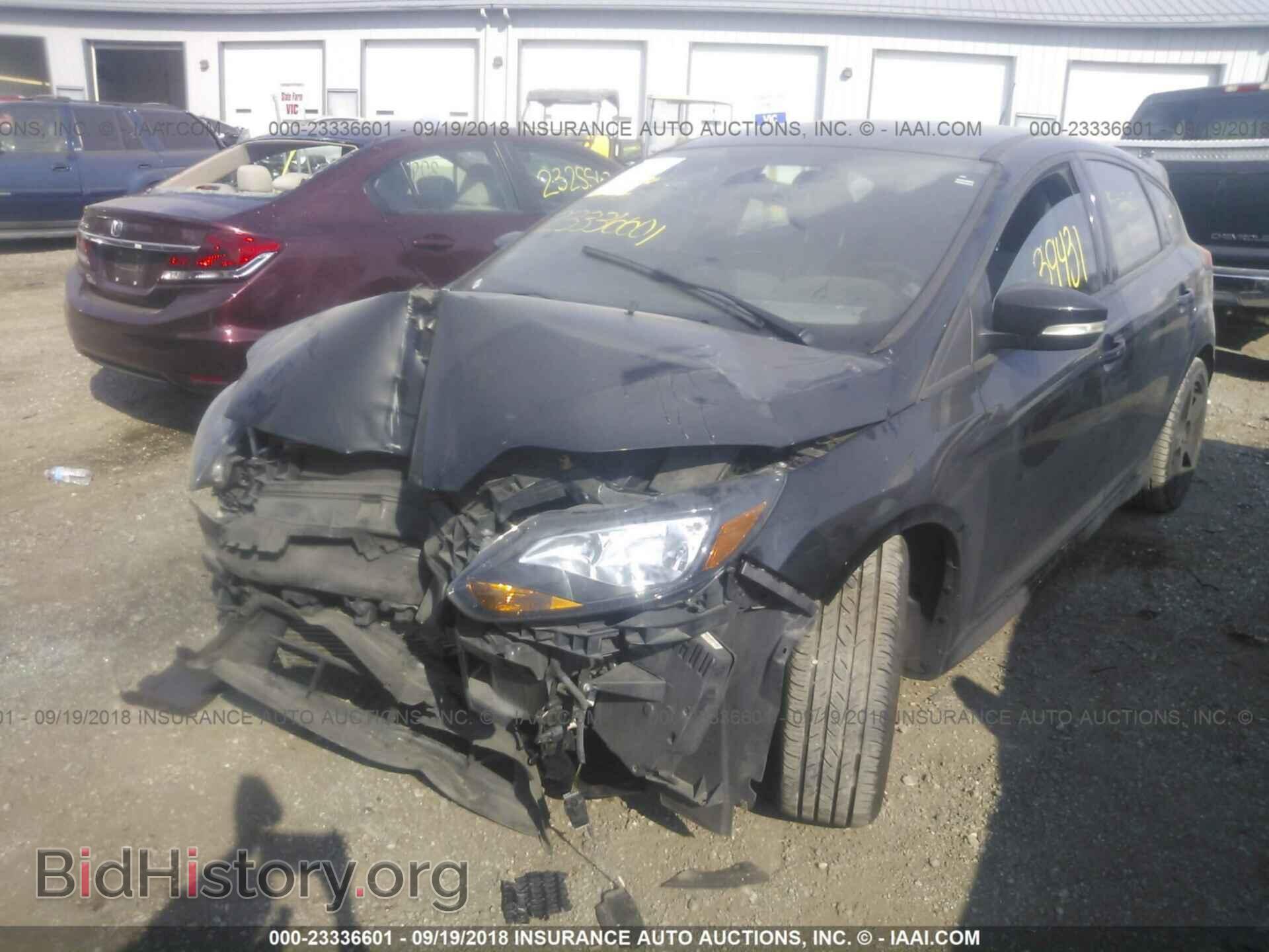 2014 Ford Focus - VIN: 1FADP3L99EL154615 - Фото 2