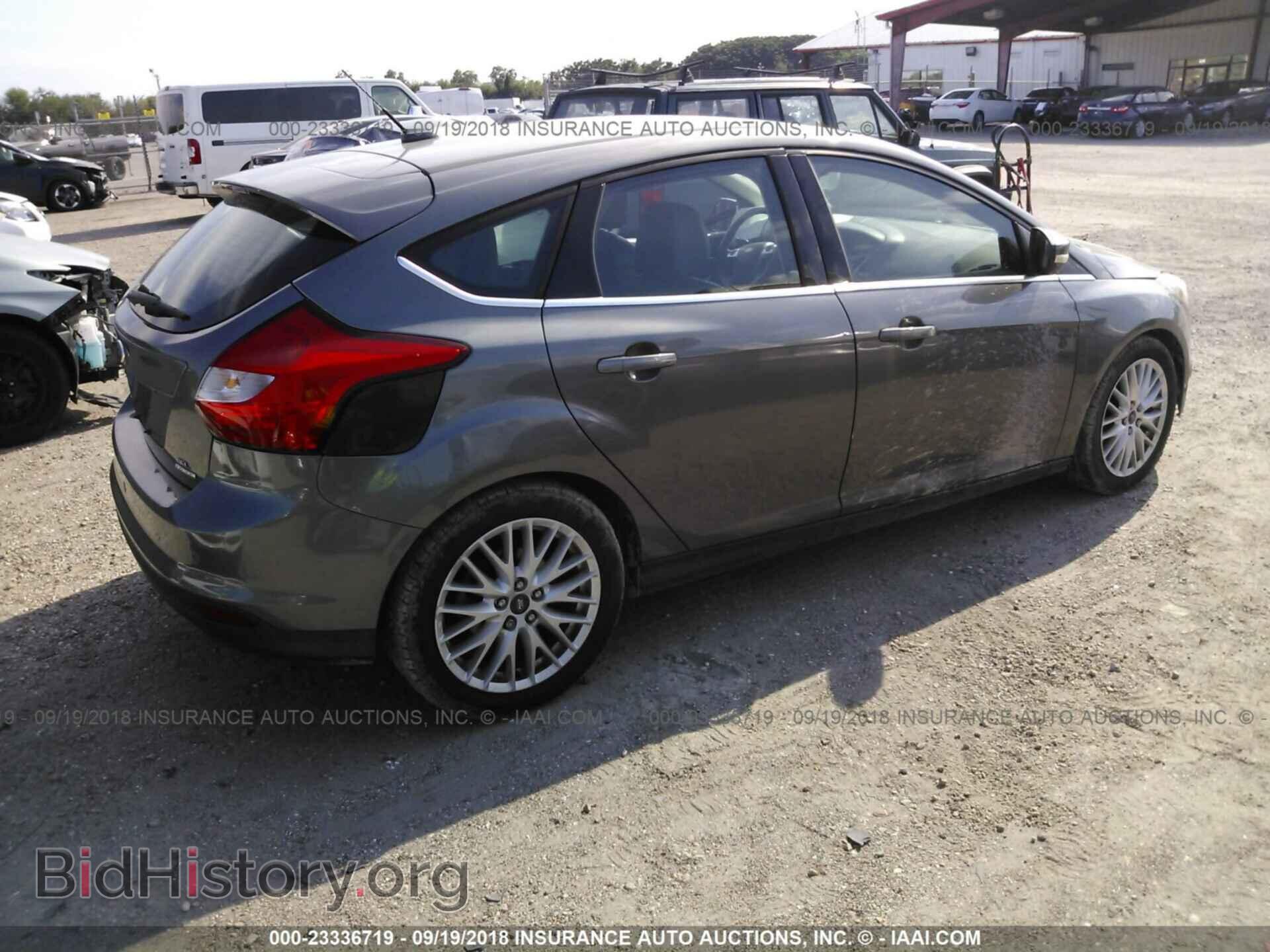 2012 Ford Focus - VIN: 1FAHP3M24CL454143 - Photo 4