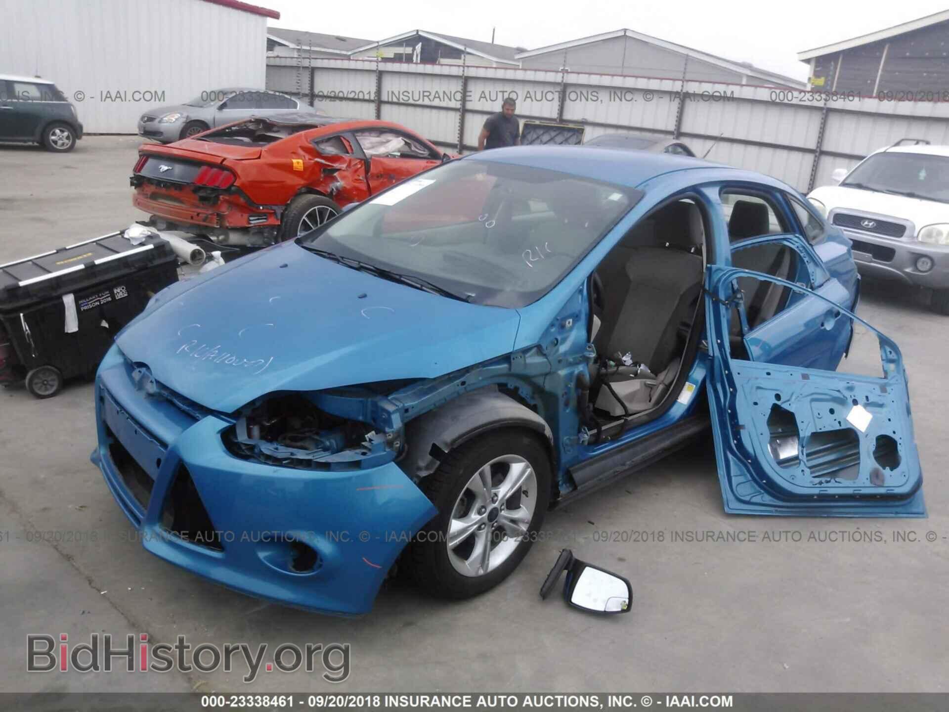 2014 Ford Focus - VIN: 1FADP3F25EL210709 - Фото 2