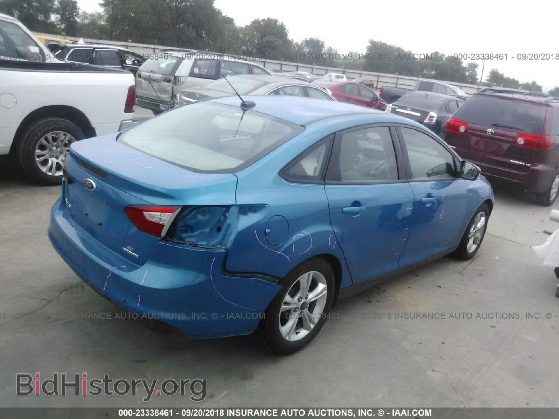 2014 Ford Focus - VIN: 1FADP3F25EL210709 - Фото 4