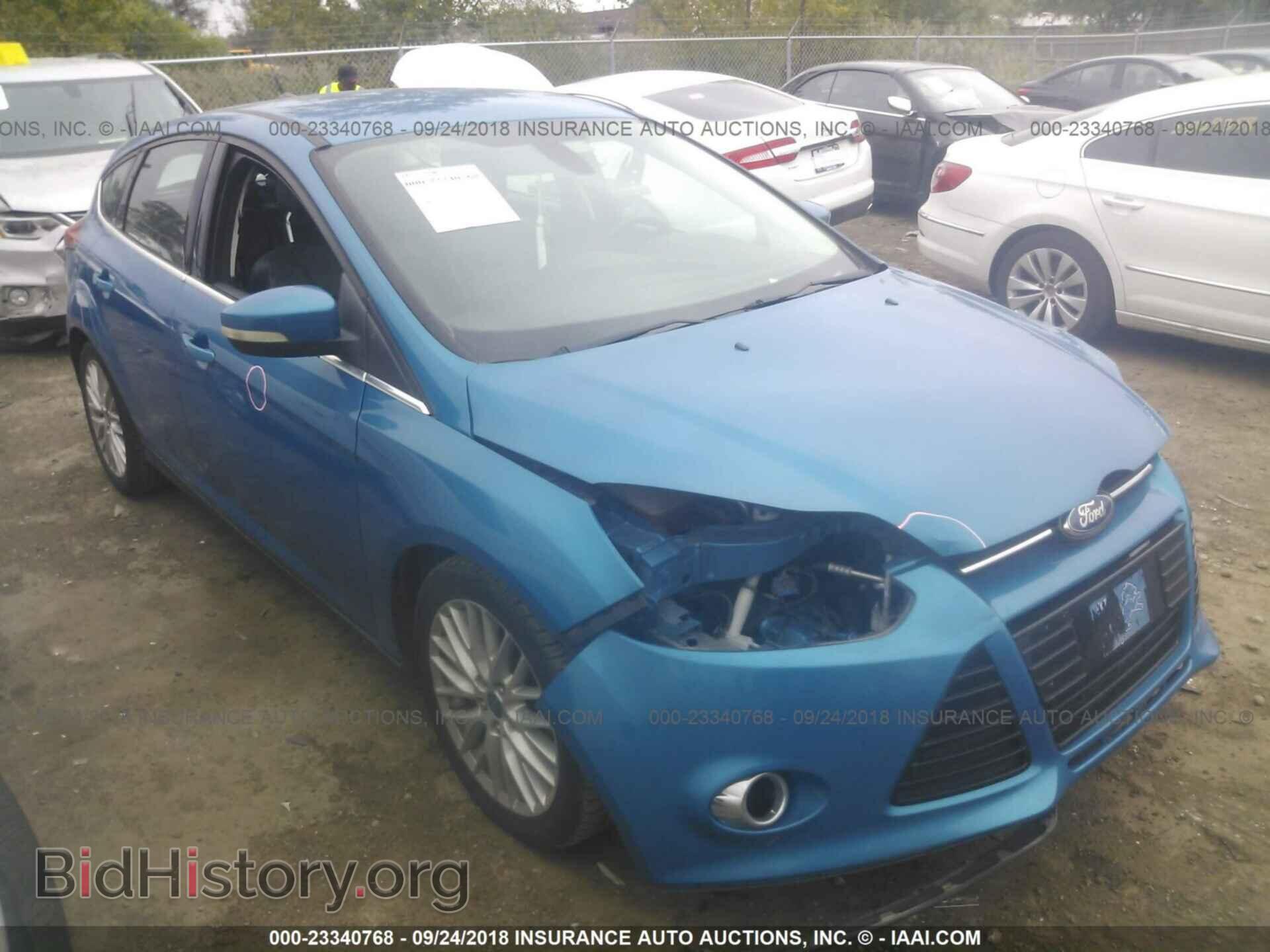 Фотография 1FAHP3M24CL104348 - Ford Focus 2012