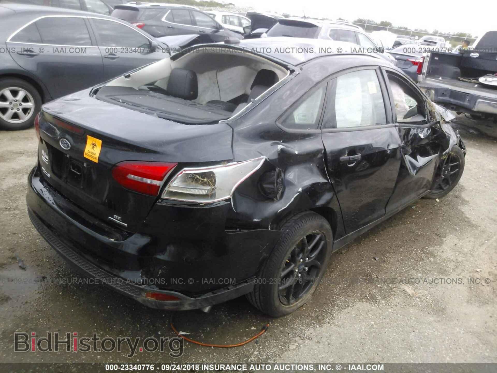 2016 Ford Focus - VIN: 1FADP3F28GL275346 - Photo 4
