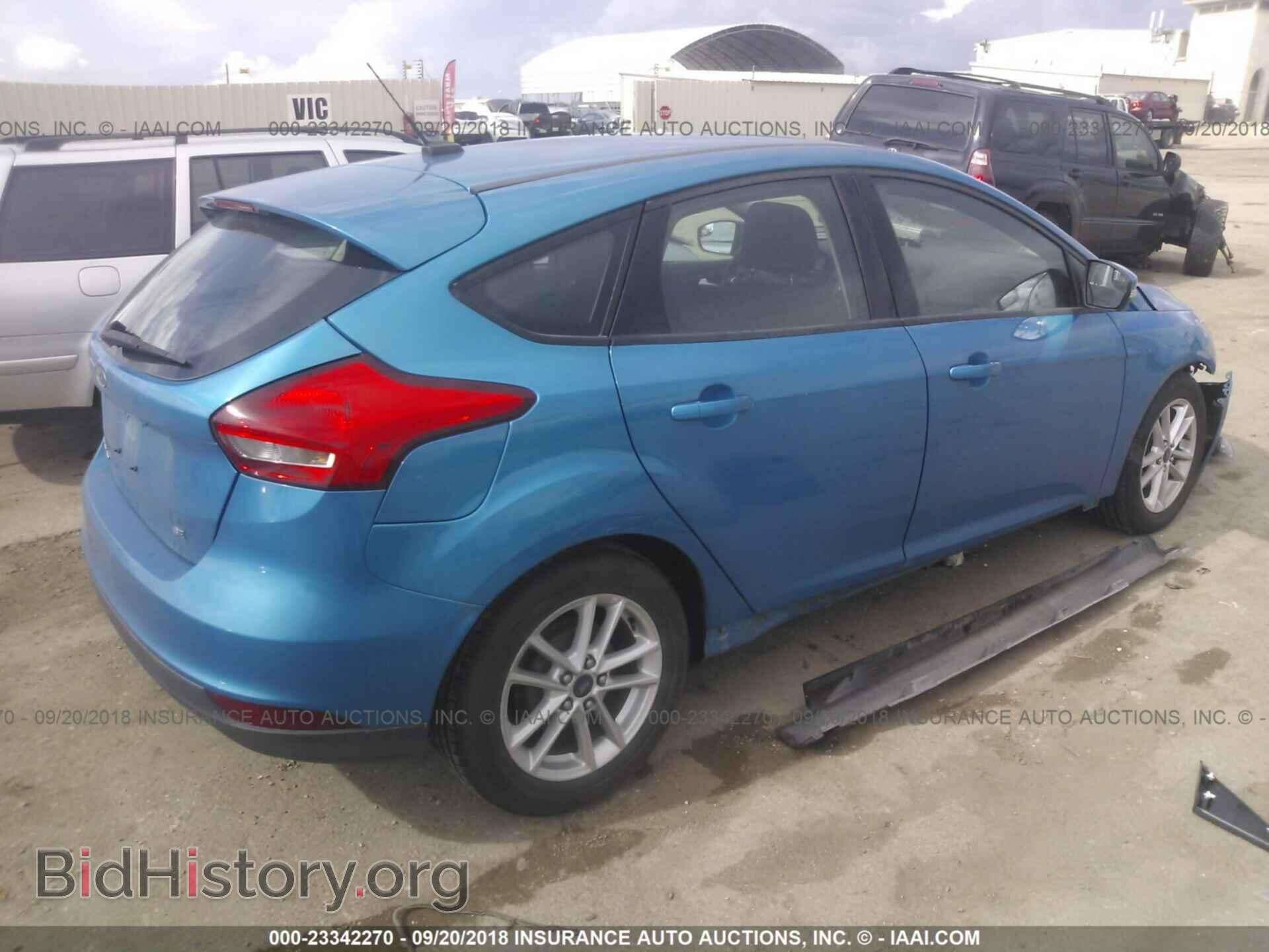 2015 Ford Focus - VIN: 1FADP3K28FL281927 - Photo 4