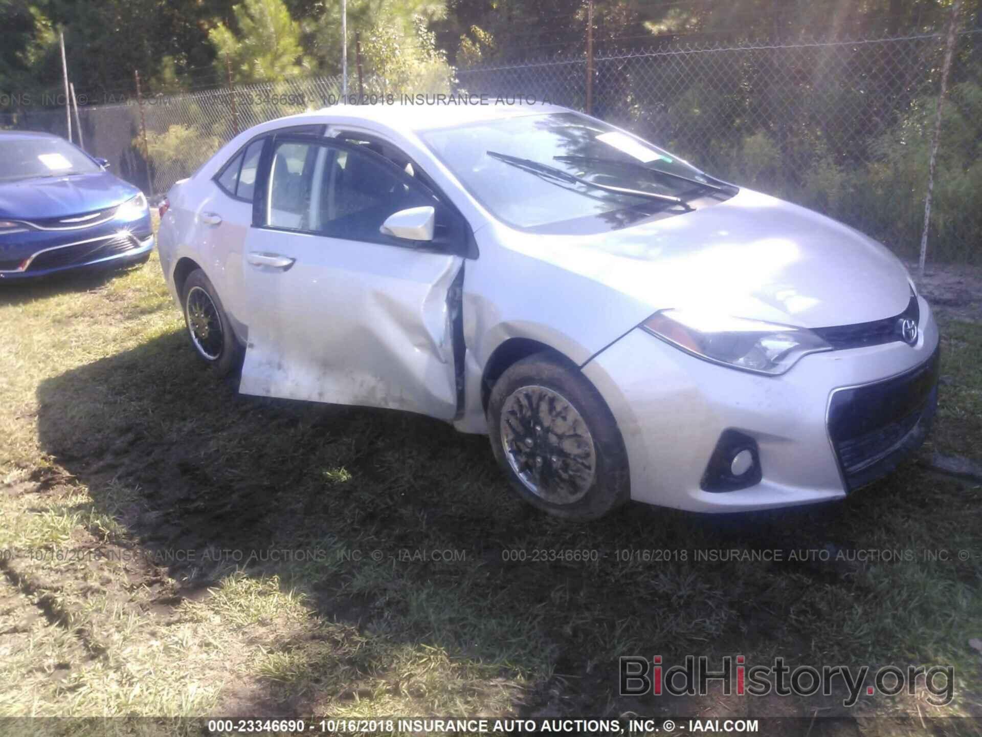 Photo 5YFBURHE8EP142045 - Toyota Corolla 2014