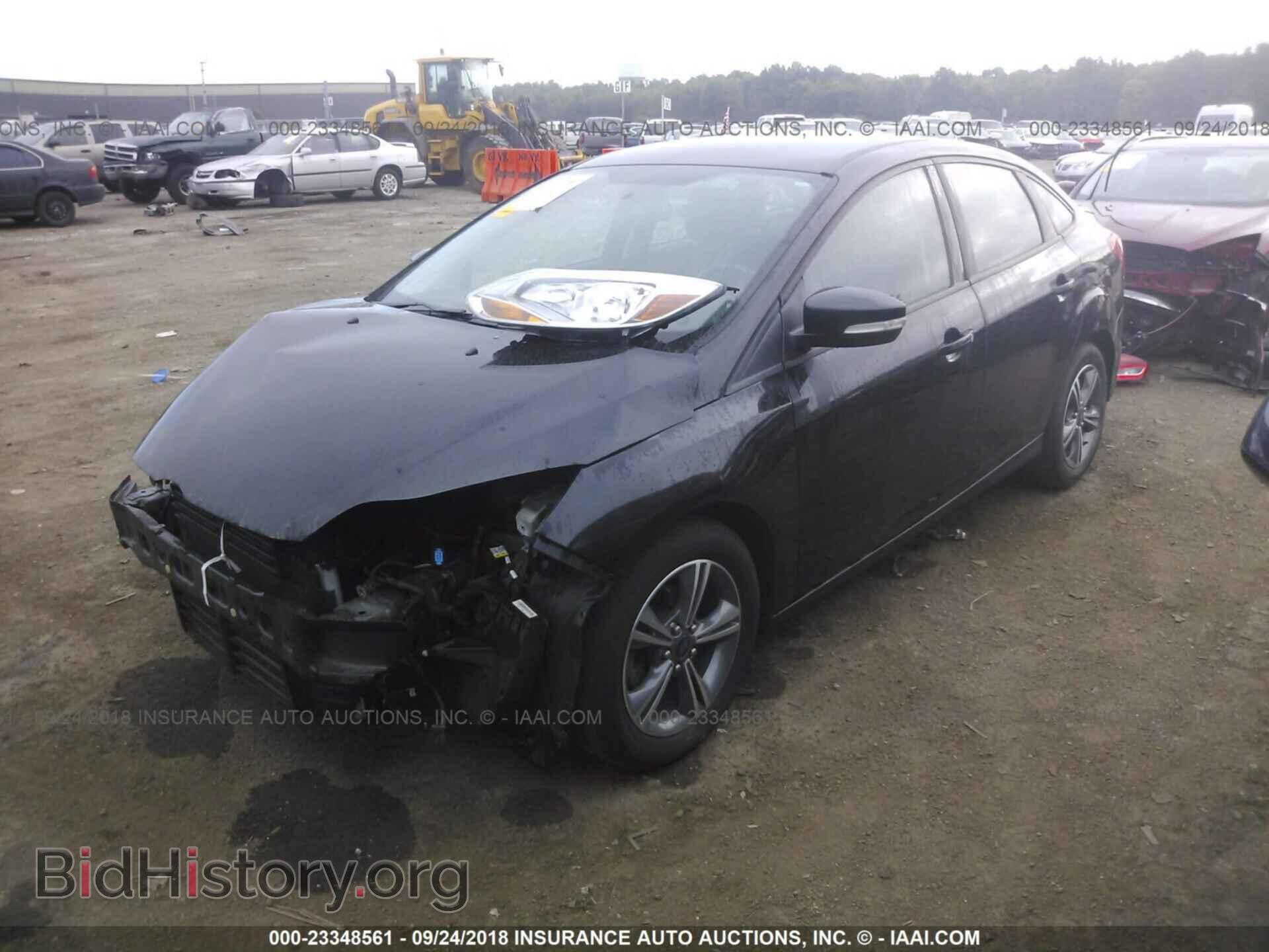 2014 Ford Focus - VIN: 1FADP3F21EL340423 - Фото 2