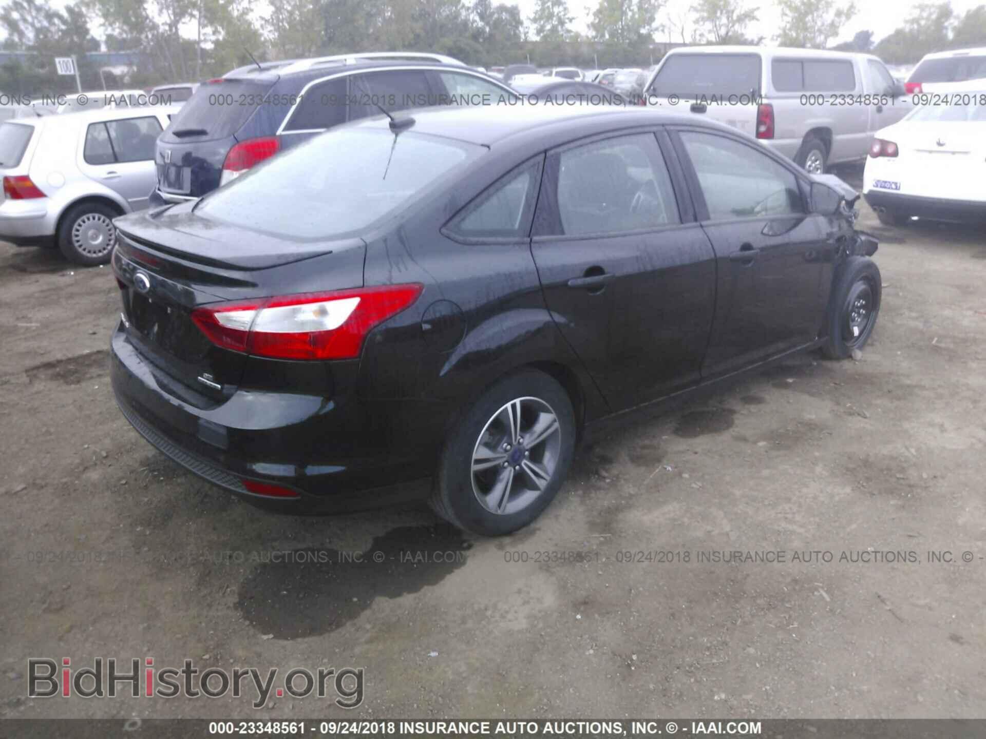 2014 Ford Focus - VIN: 1FADP3F21EL340423 - Фото 4