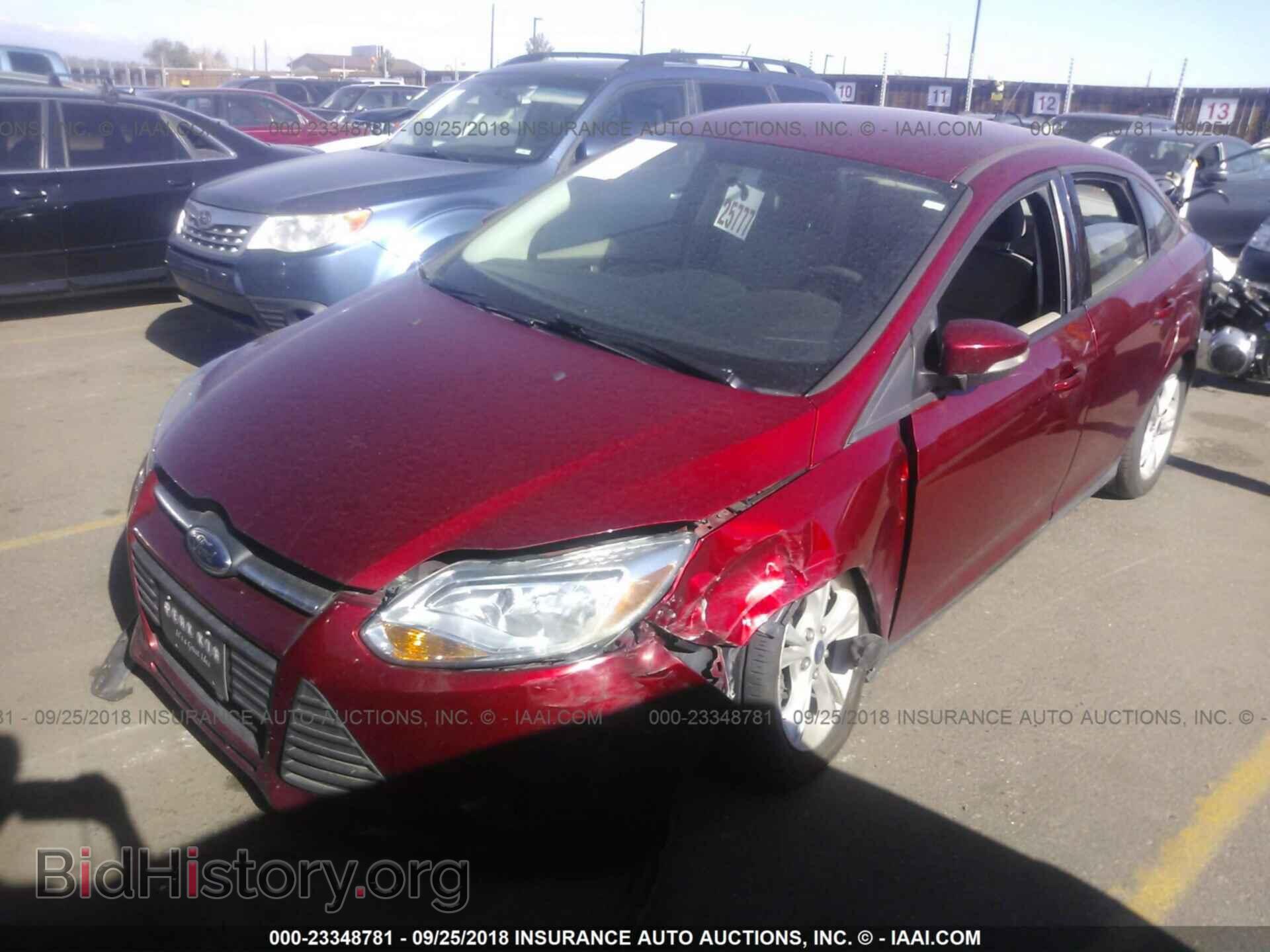 2014 Ford Focus - VIN: 1FADP3F29EL413201 - Фото 2
