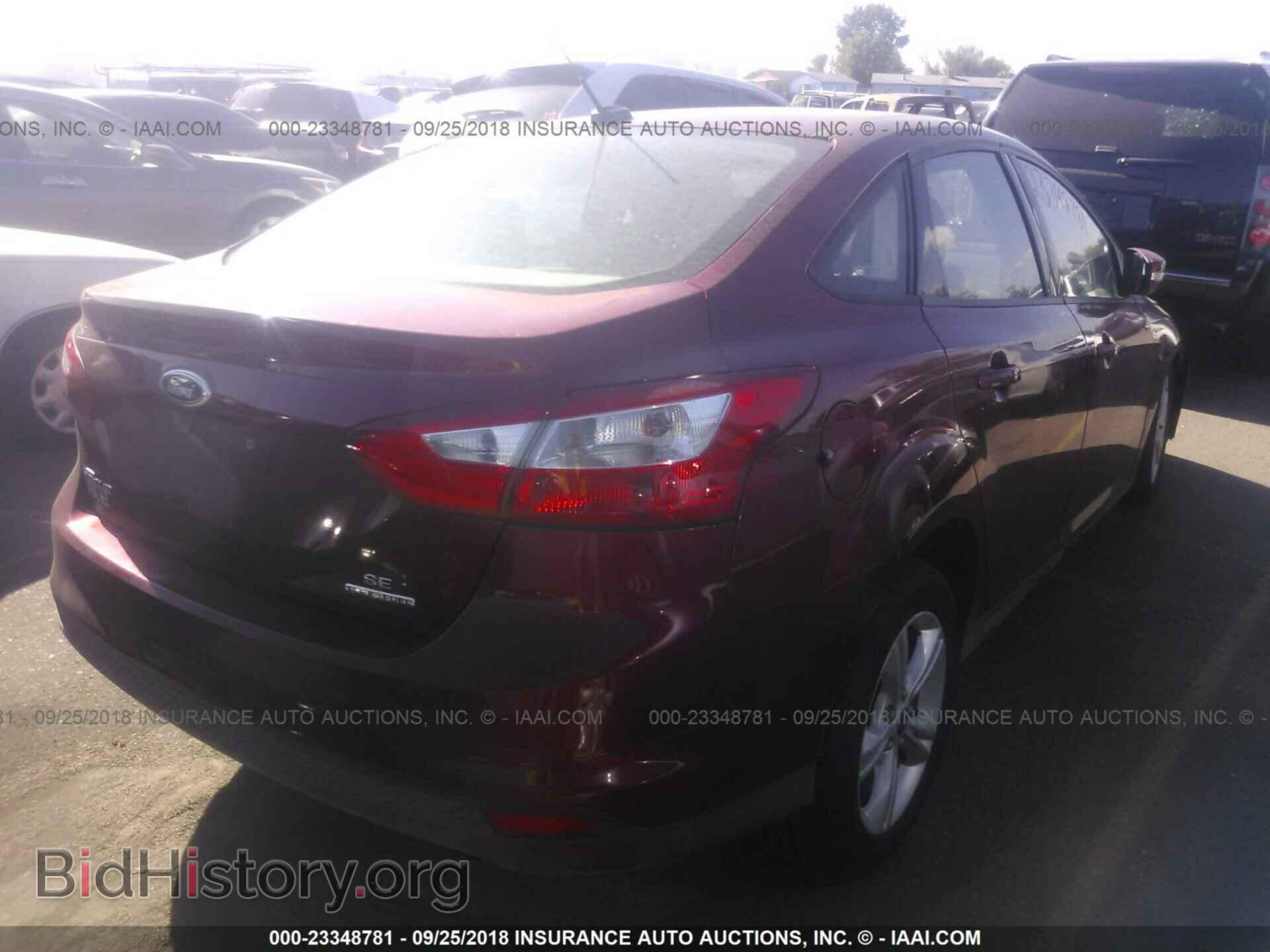 2014 Ford Focus - VIN: 1FADP3F29EL413201 - Фото 4