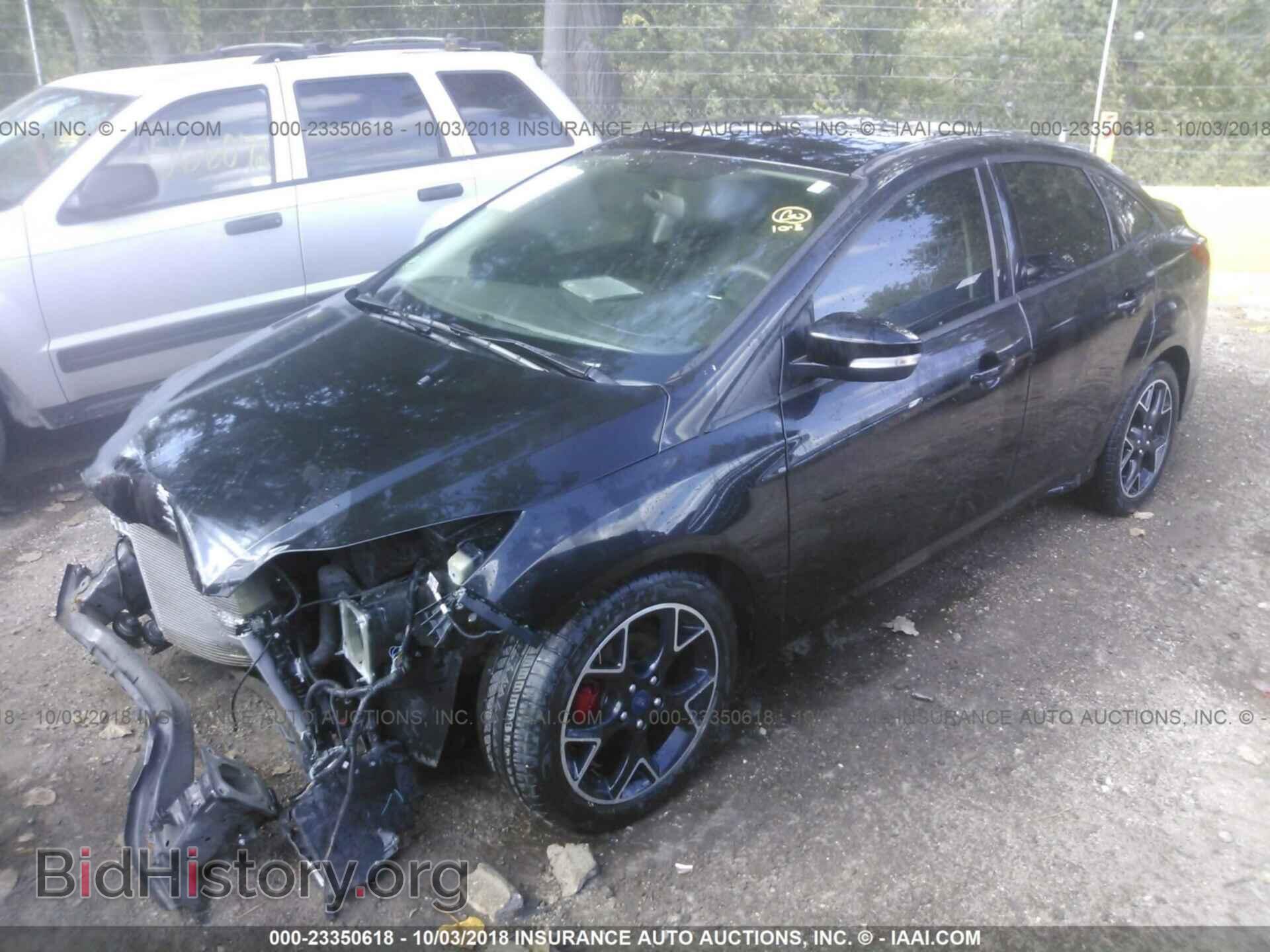 2014 Ford Focus - VIN: 1FADP3F27EL439036 - Photo 2