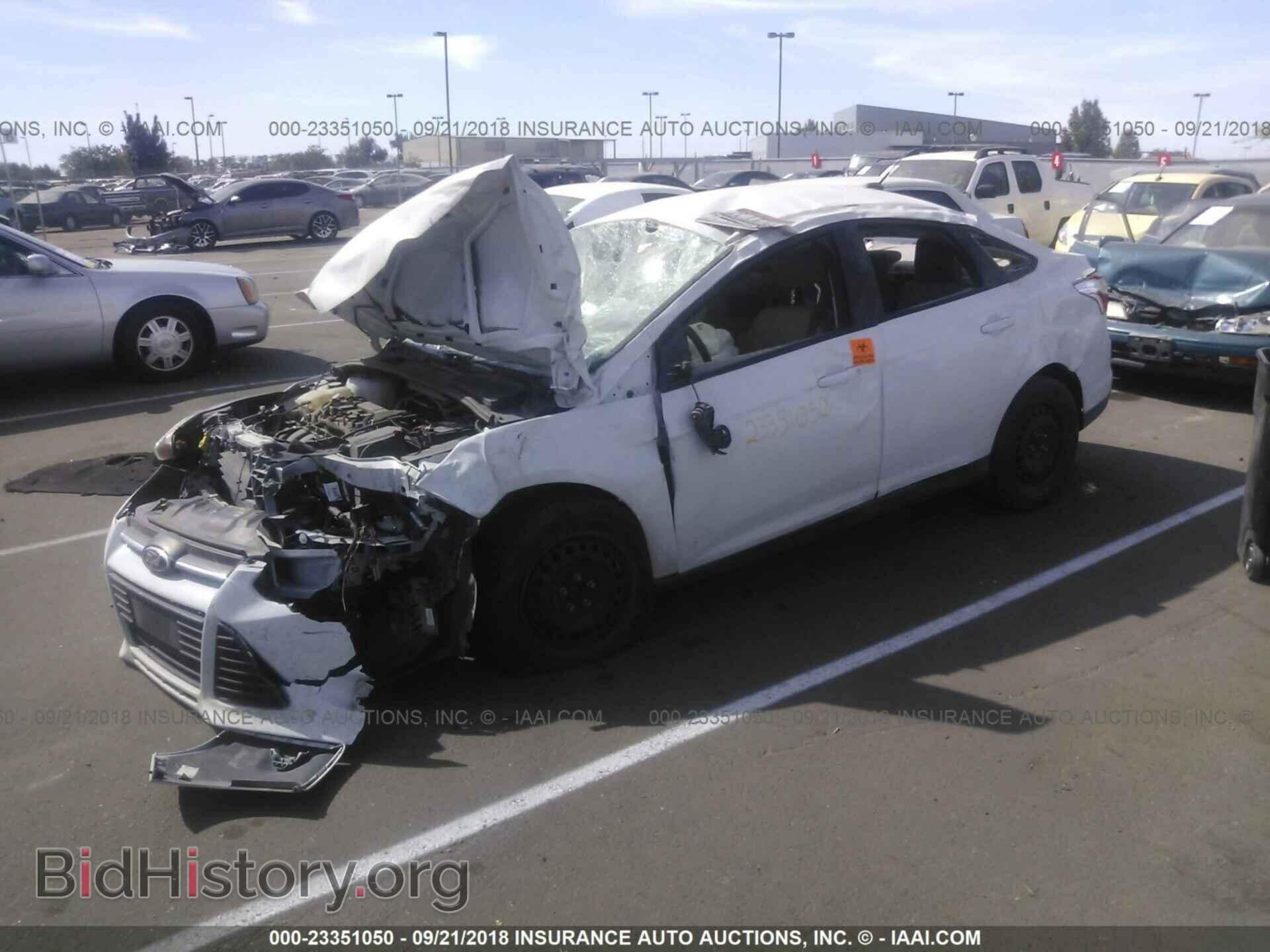 2012 Ford Focus - VIN: 1FAHP3F21CL361934 - Photo 2
