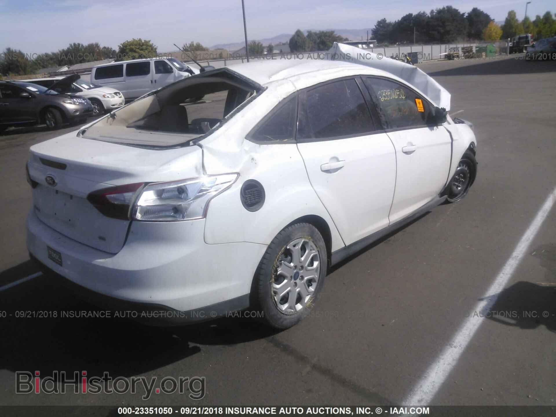 2012 Ford Focus - VIN: 1FAHP3F21CL361934 - Photo 4