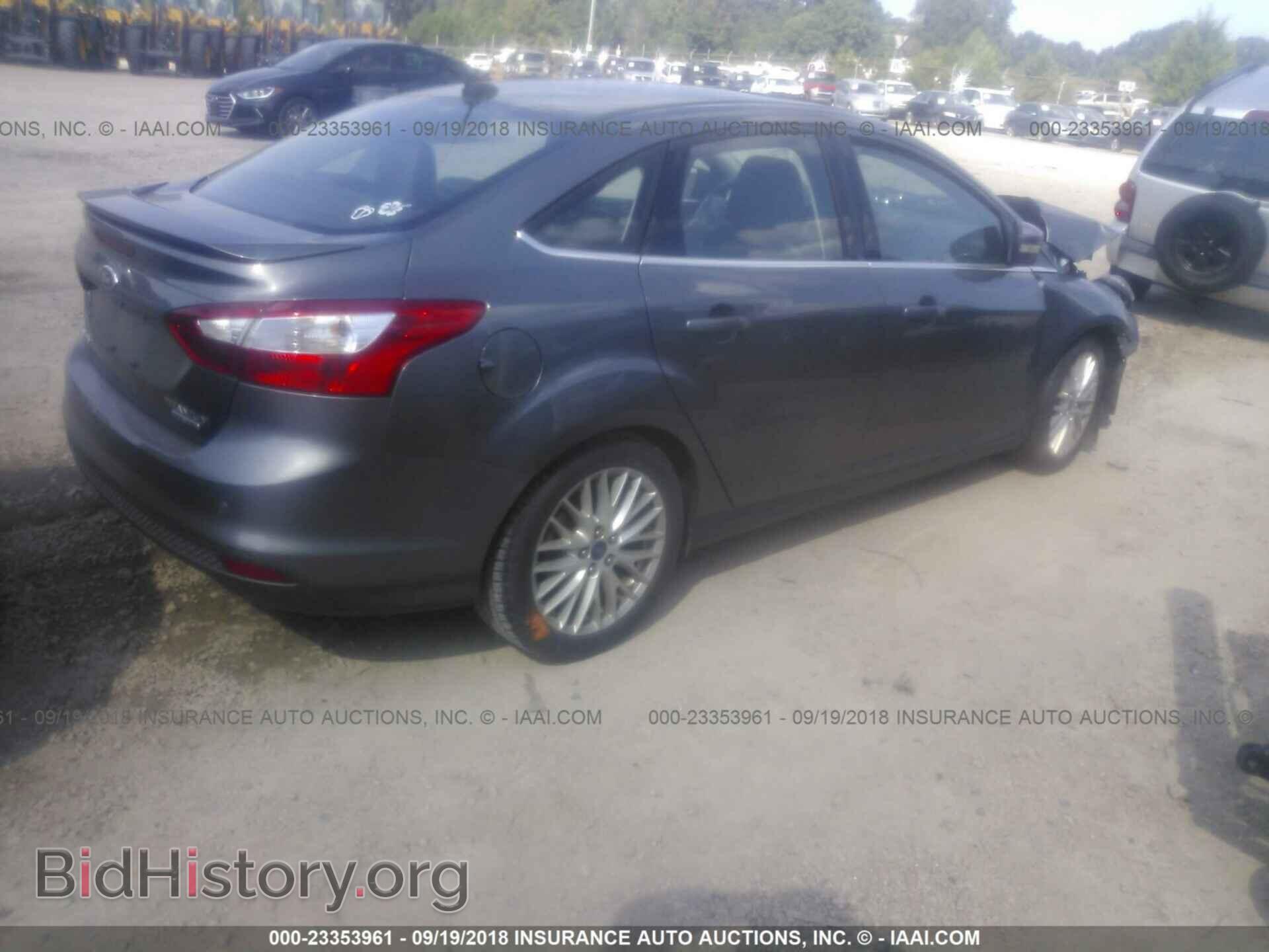 2014 Ford Focus - VIN: 1FADP3J21EL315920 - Photo 4