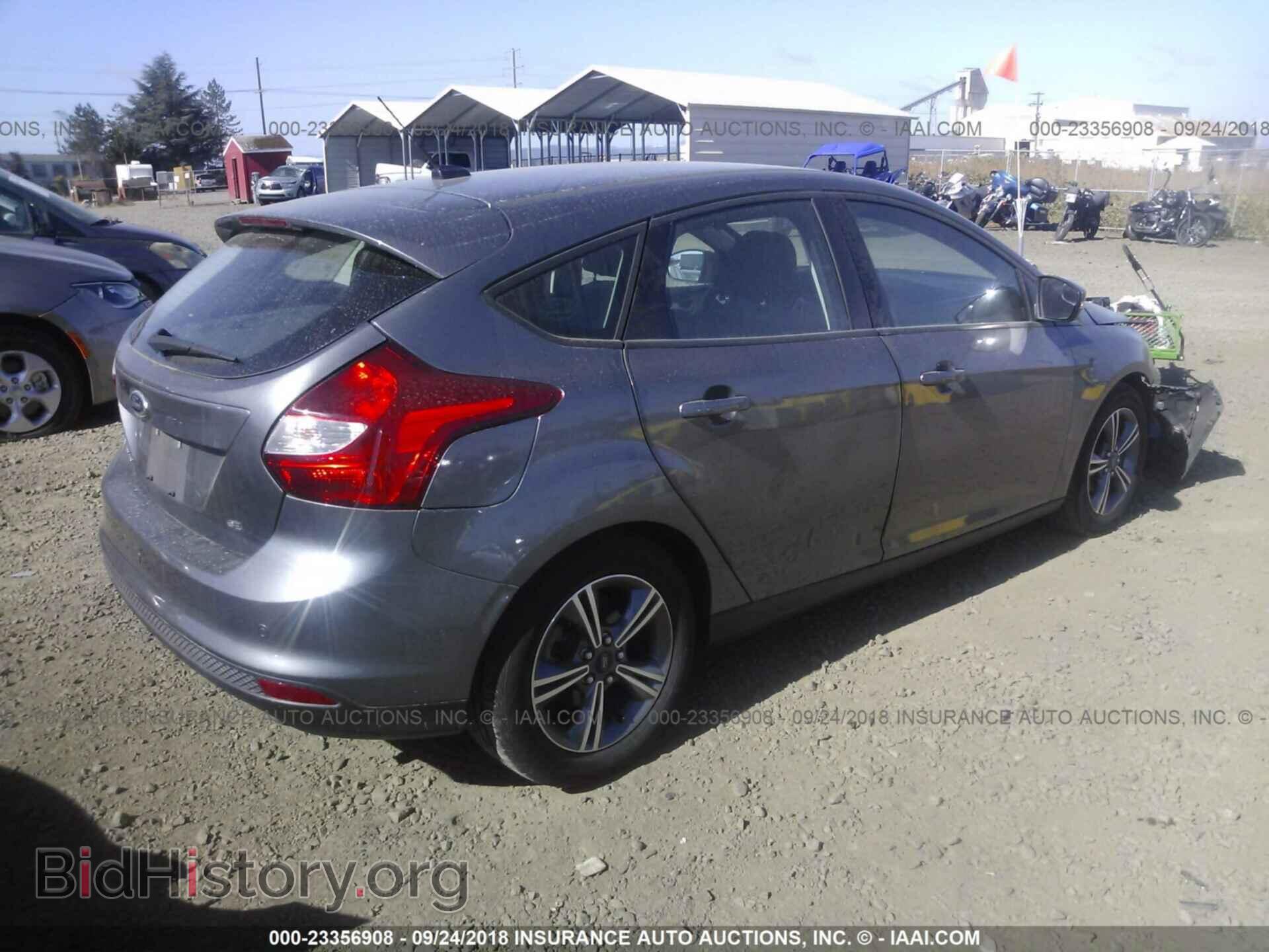 2014 Ford Focus - VIN: 1FADP3K21EL420925 - Photo 4