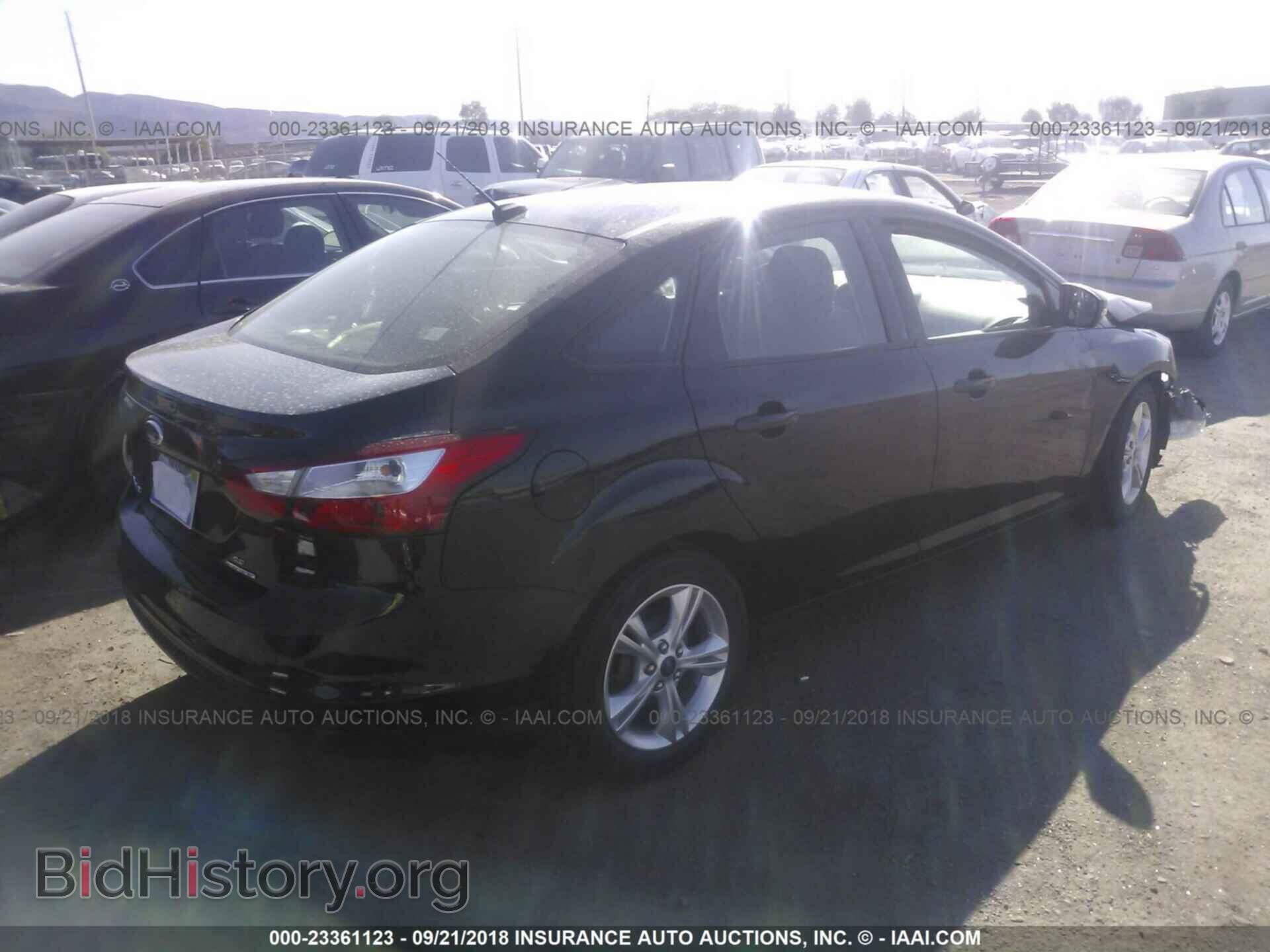 2014 Ford Focus - VIN: 1FADP3F20EL247523 - Фото 4