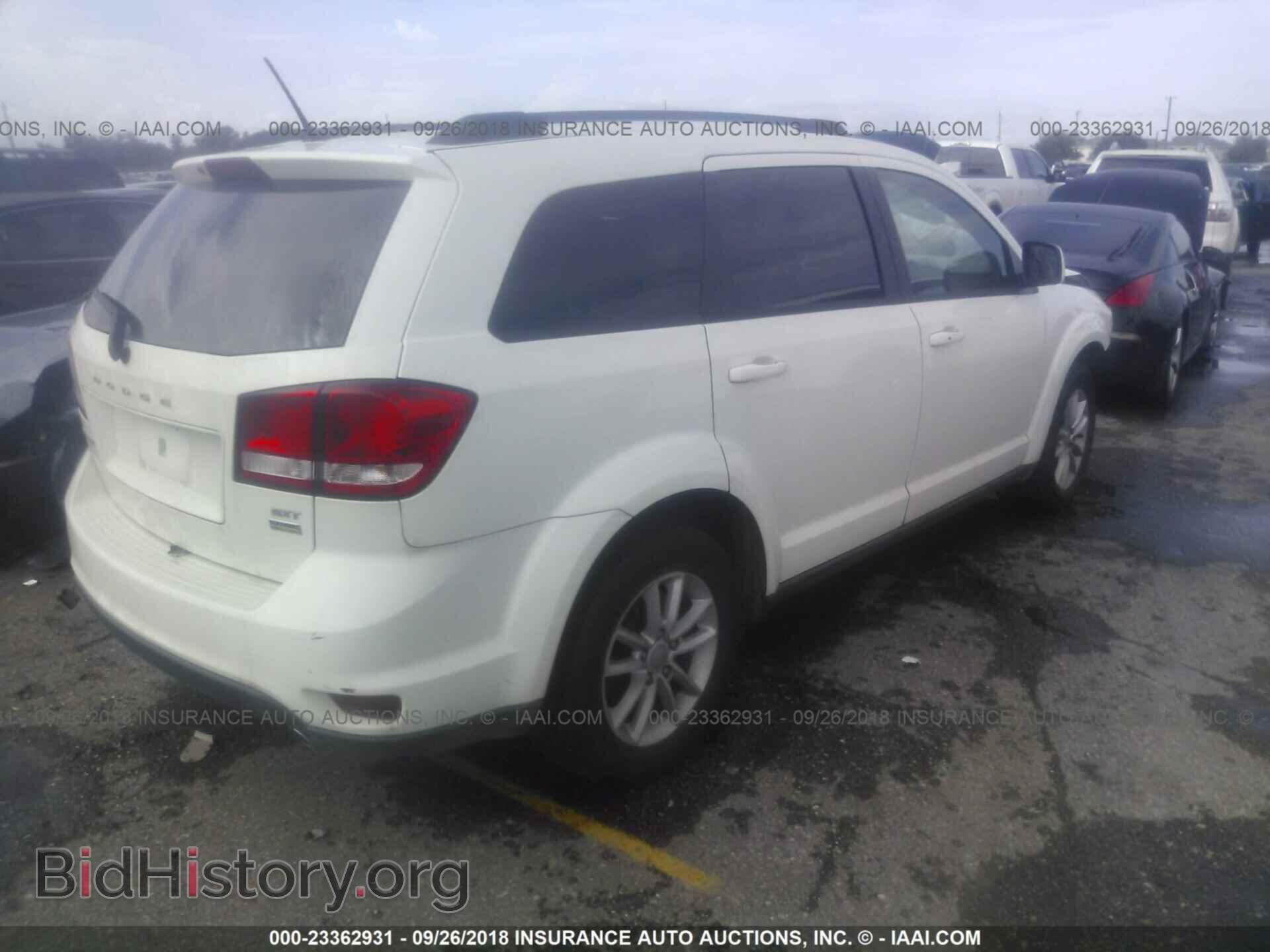 2014 Dodge Journey - VIN: 3C4PDCBG9ET142629 - Фото 4