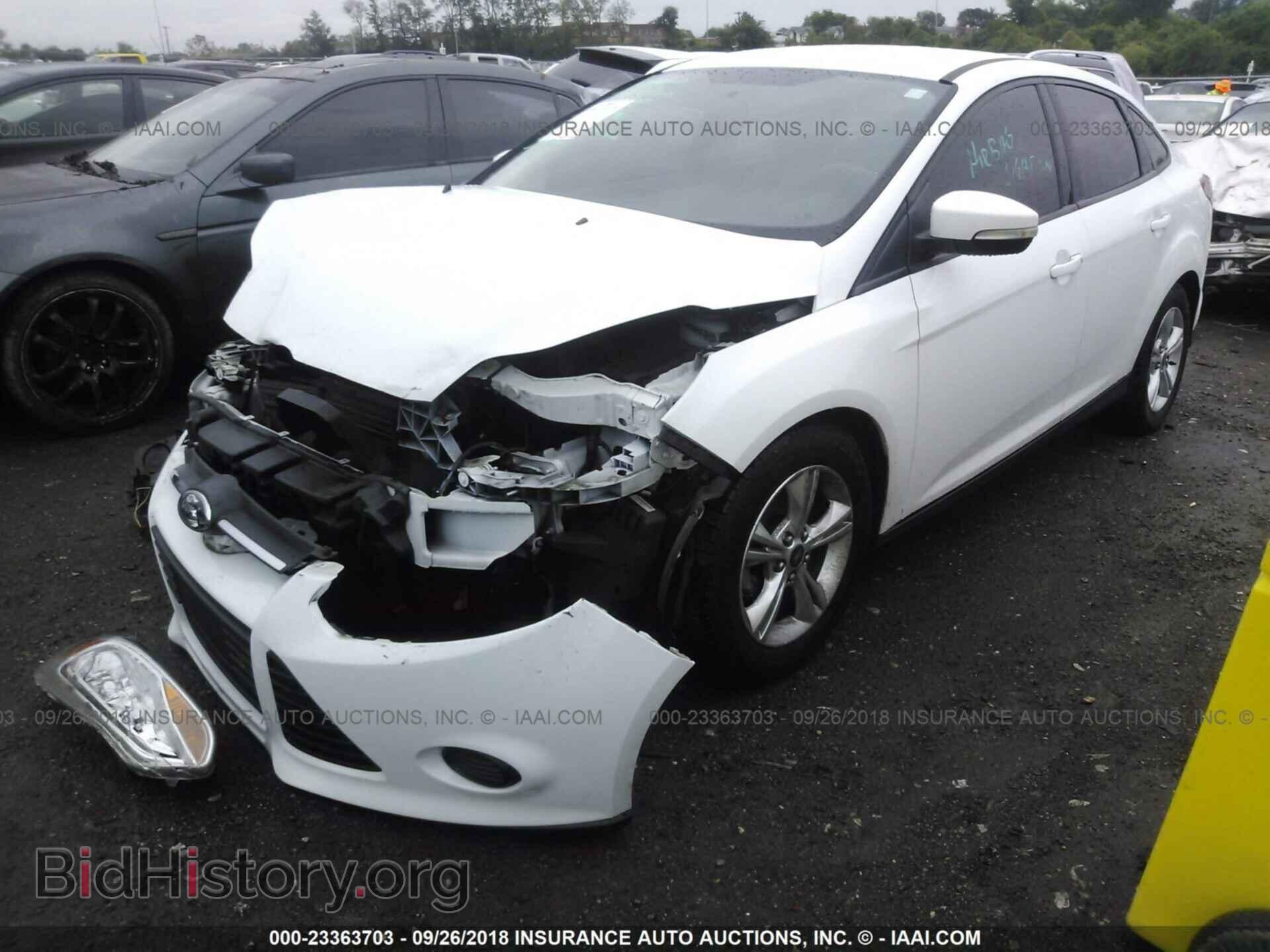 2013 Ford Focus - VIN: 1FADP3F2XDL111673 - Photo 2