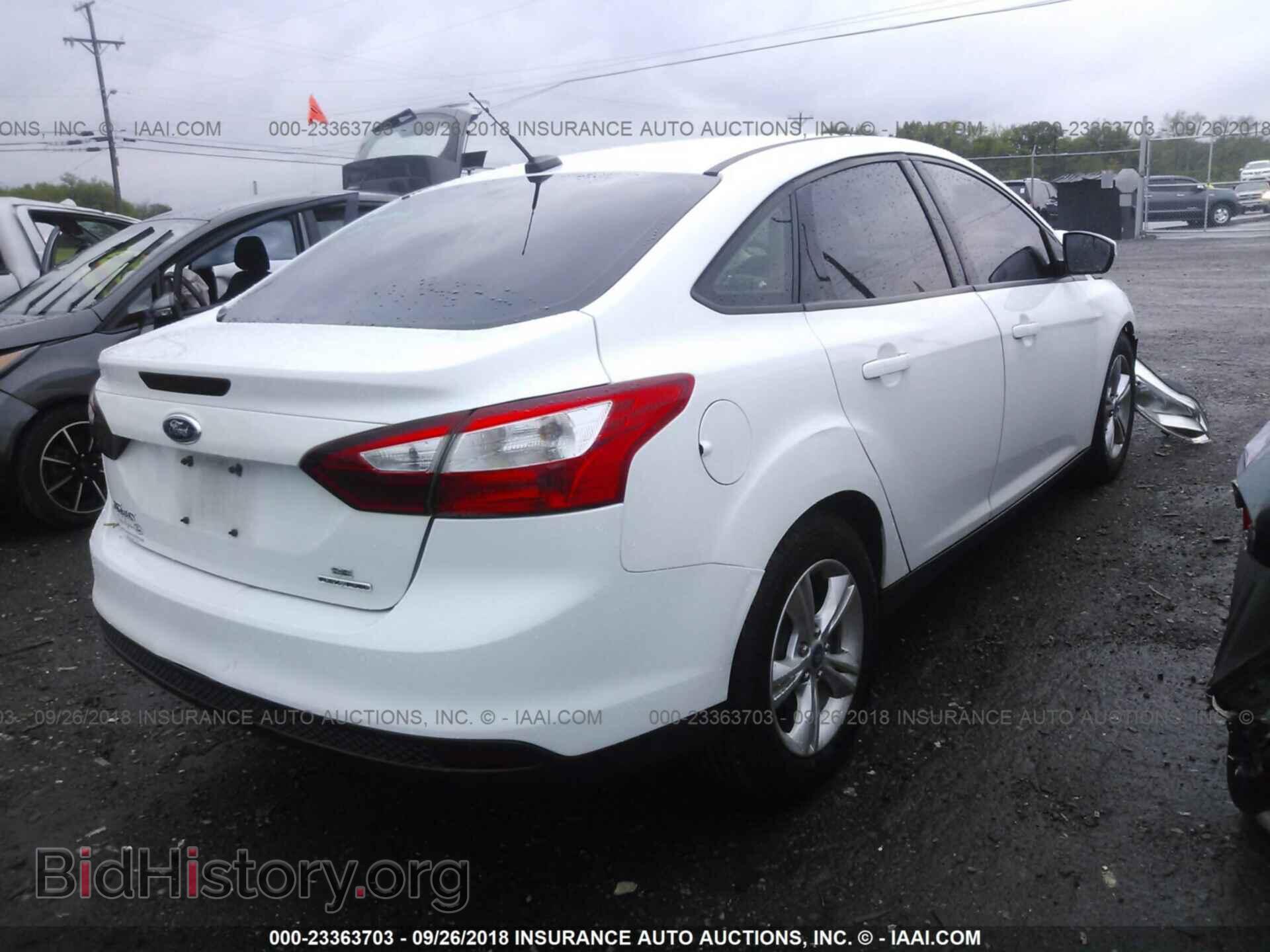 2013 Ford Focus - VIN: 1FADP3F2XDL111673 - Photo 4