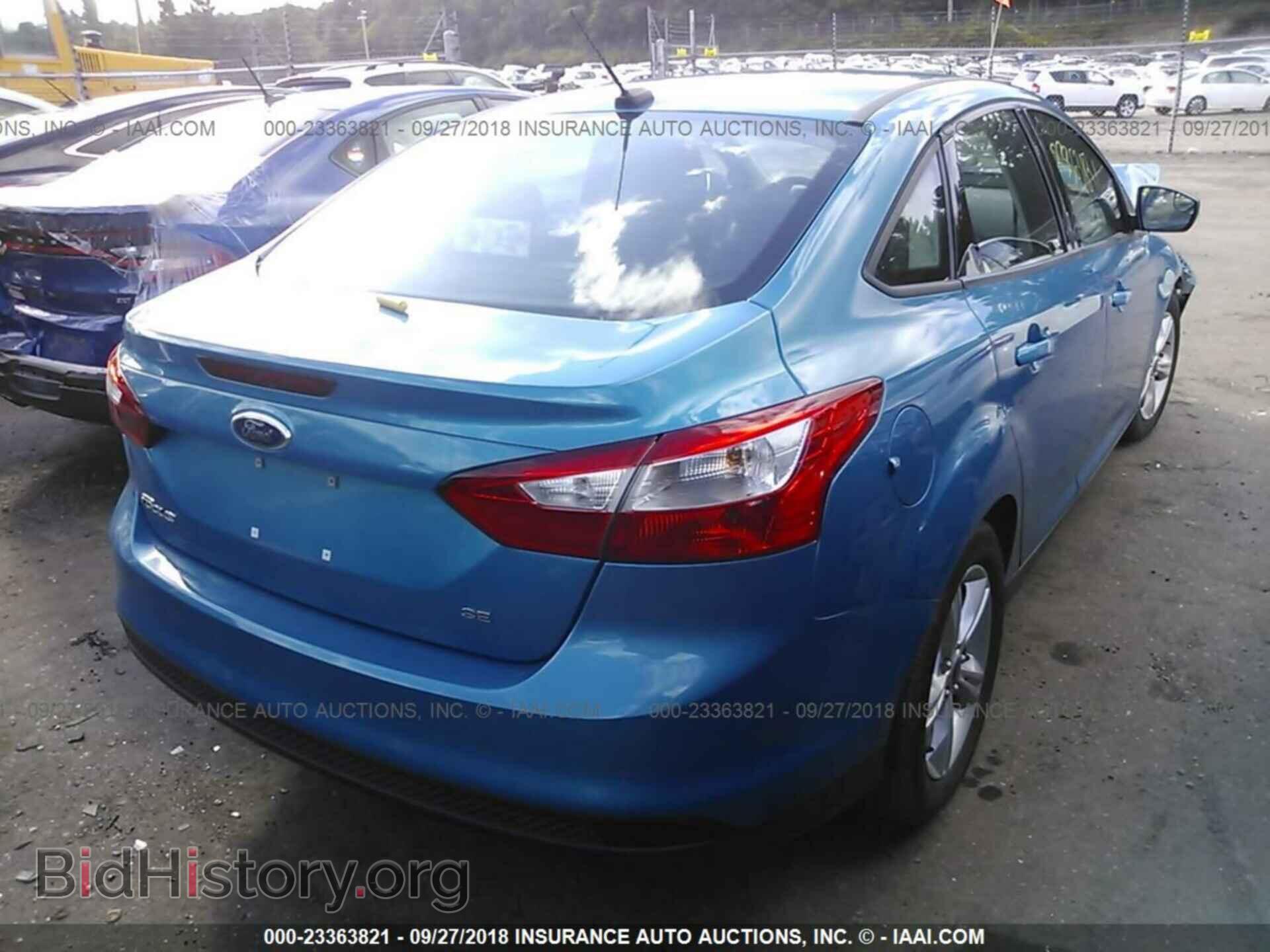 2014 Ford Focus - VIN: 1FADP3F22EL201353 - Фото 4