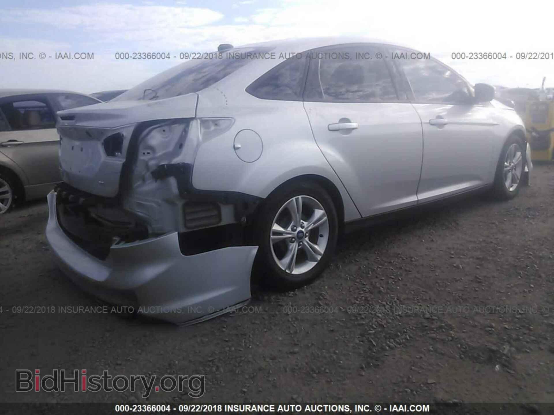 2014 Ford Focus - VIN: 1FADP3F25EL219460 - Фото 4