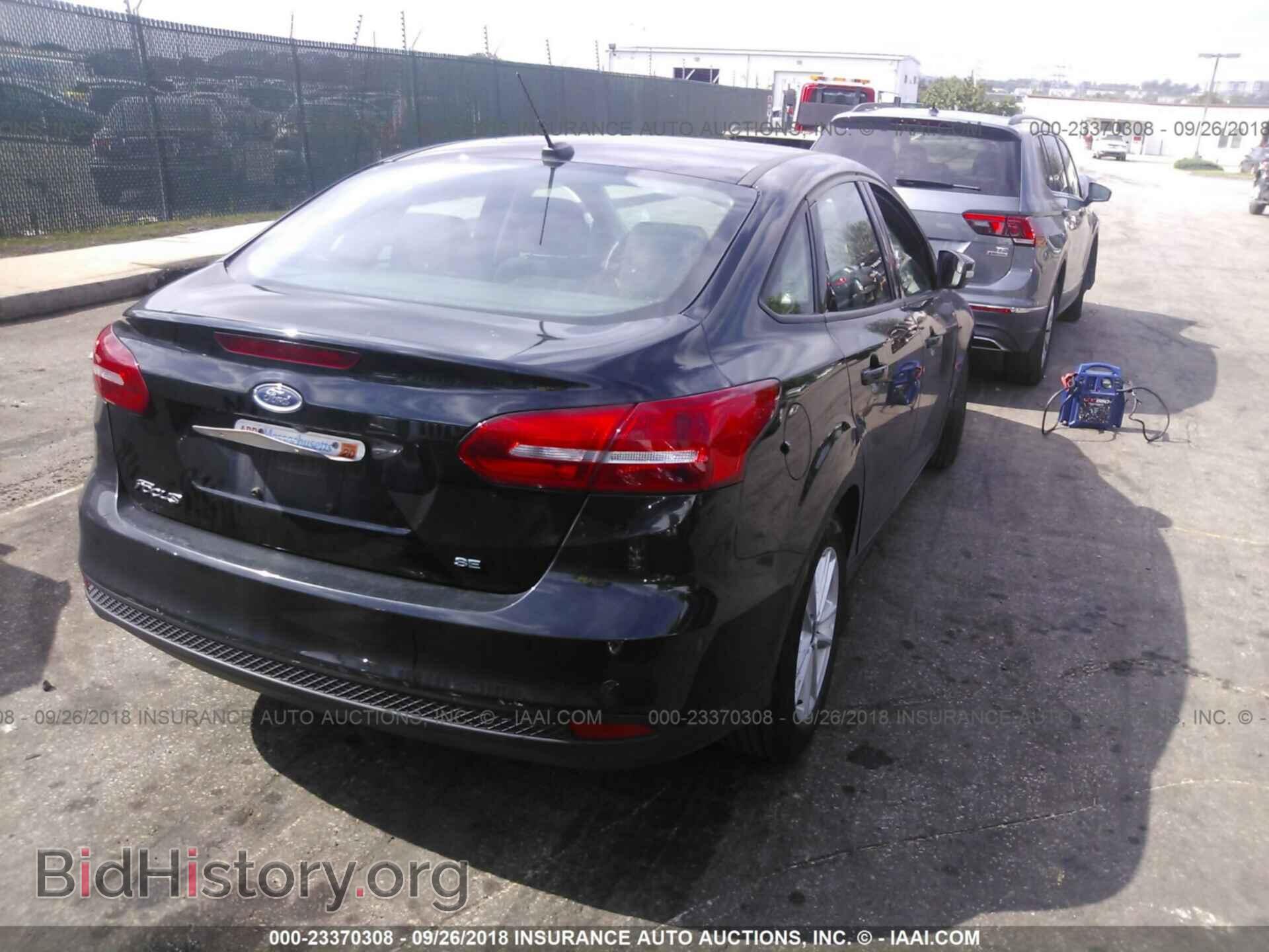 2016 Ford Focus - VIN: 1FADP3F2XGL297770 - Photo 4